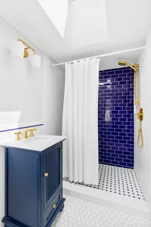 a bathroom with a sink and a bathtub