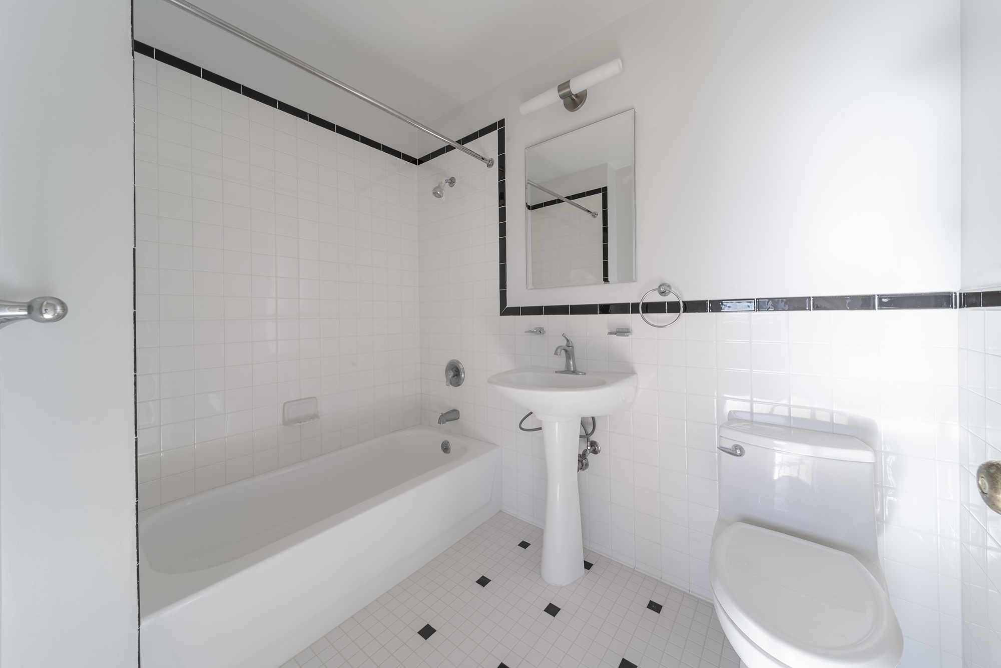 7 Mt Morris Park West, Unit D Manhattan, NY 10027 - Photo 10 of 16 a bathroom with a bathtub a toilet and a shower