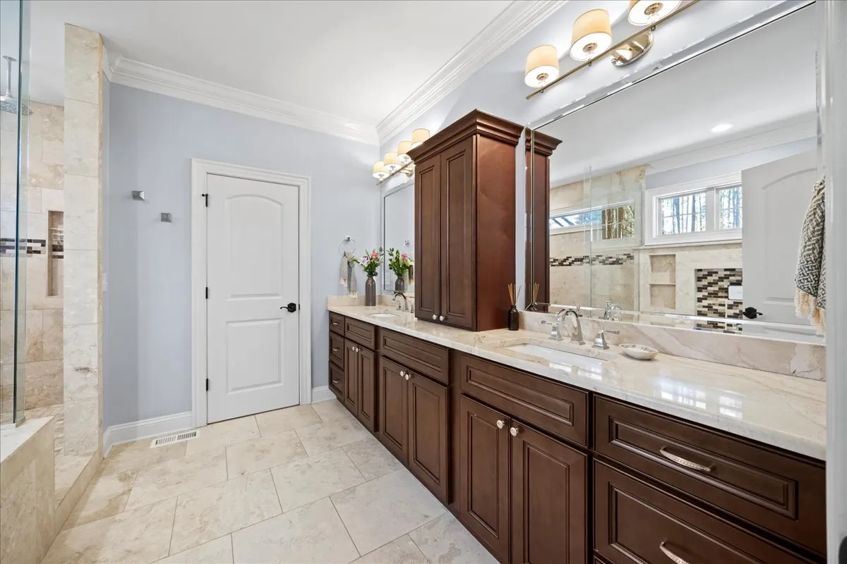 a view of a livingroom with furniture and a flat screen tv
