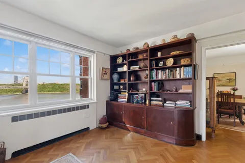 a room with furniture and a large window