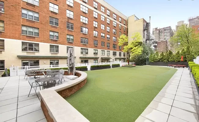 516 West 47th Street, Unit N7A Manhattan, NY 10036 - Photo 14 of 19 a view of a swimming pool with a lounge chairs