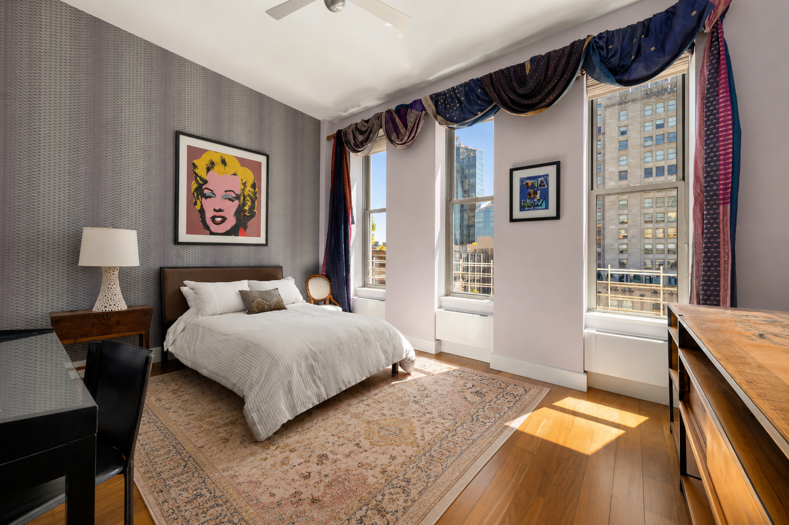 15 East 26th Street, Unit 16BC Manhattan, NY 10010 - Photo 18 of 27 a bedroom with a bed and a furniture on the dresser