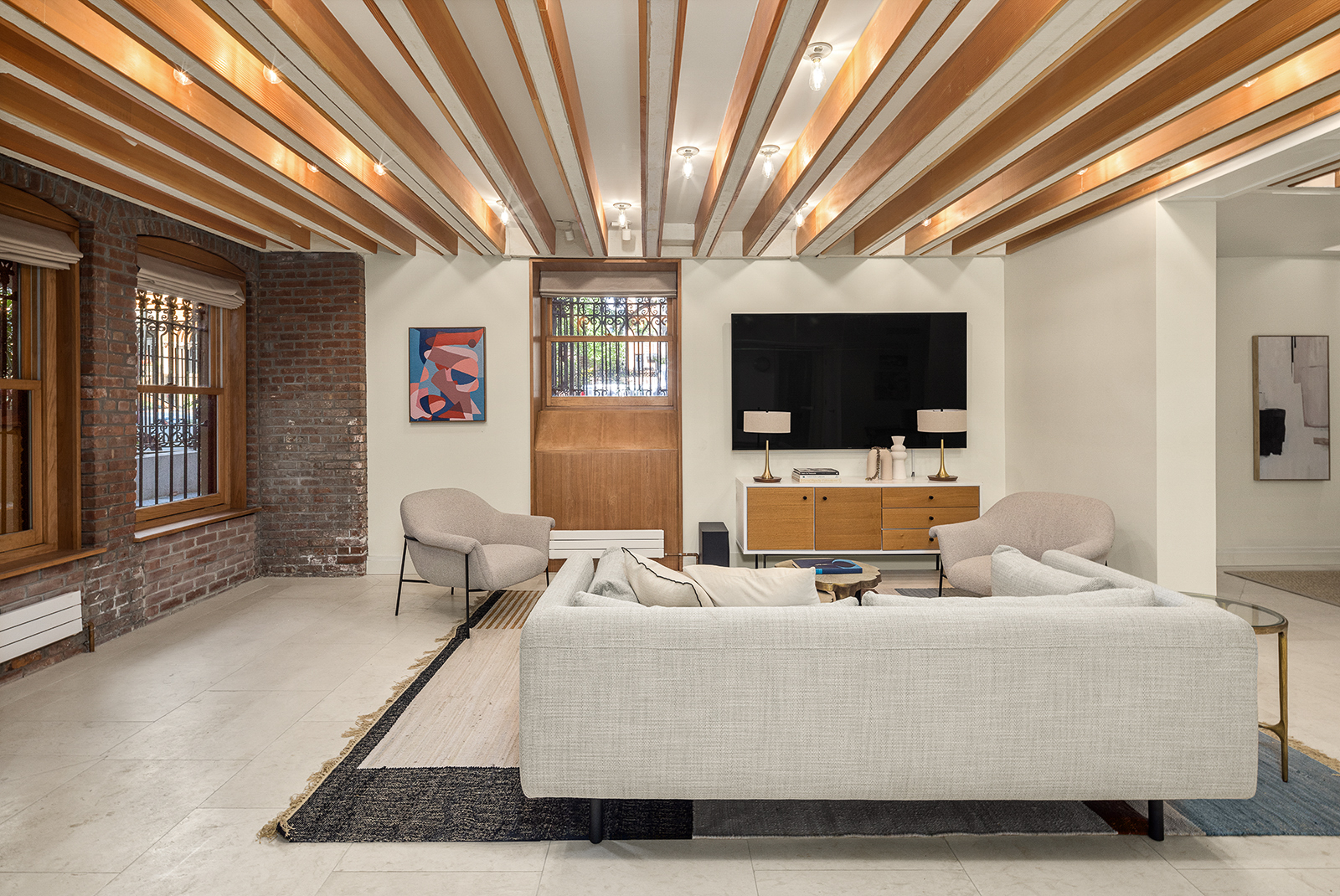 18 Prospect Park West Brooklyn, NY 11215 - Photo 37 of 40 a living room with furniture and a flat screen tv