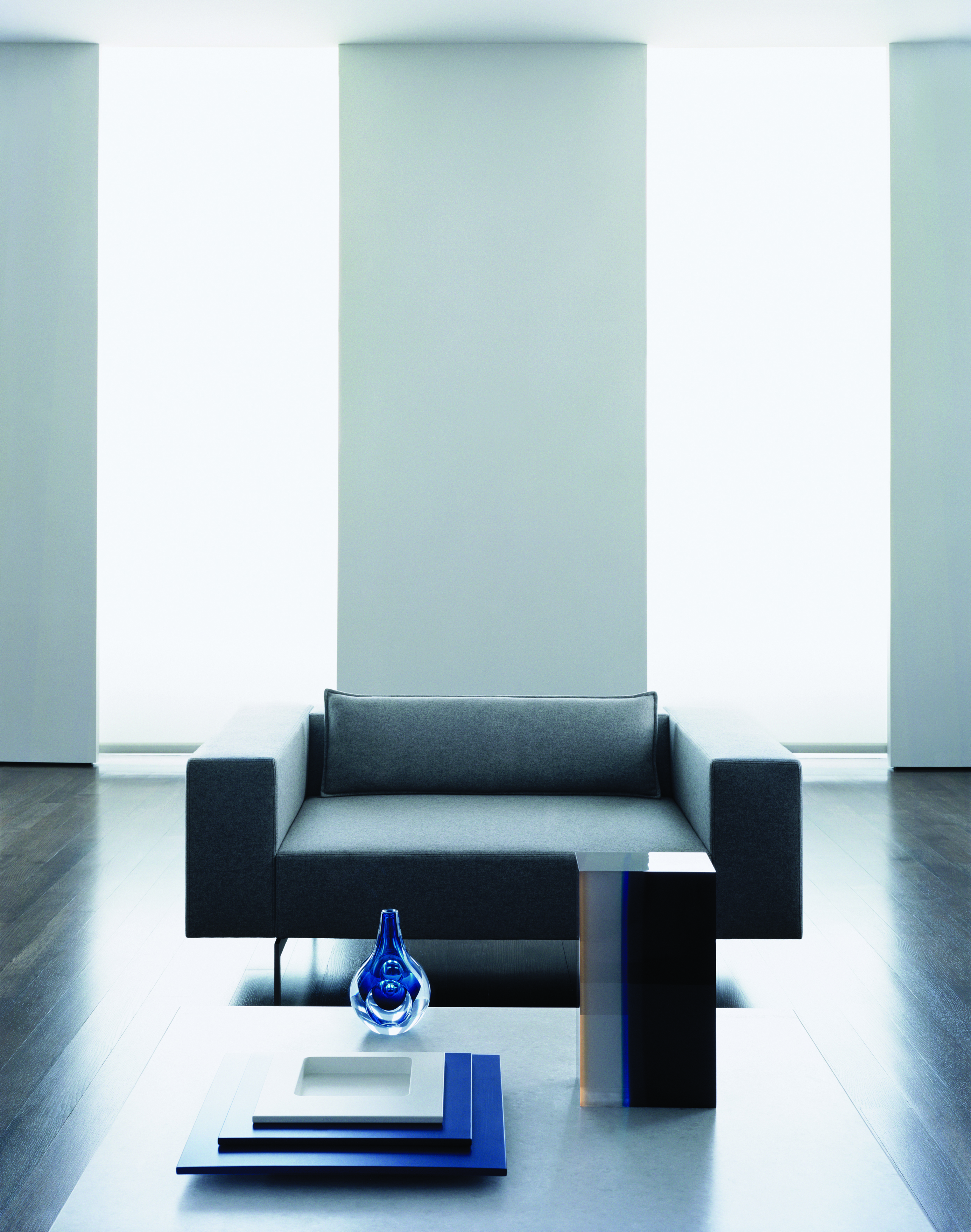 158 Mercer Street, Unit 7MERCER Manhattan, NY 10012 - Photo 4 of 13 a living room with furniture and a wooden floor