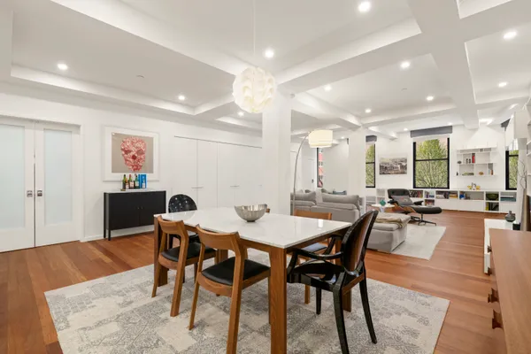 a view of a dining room with furniture