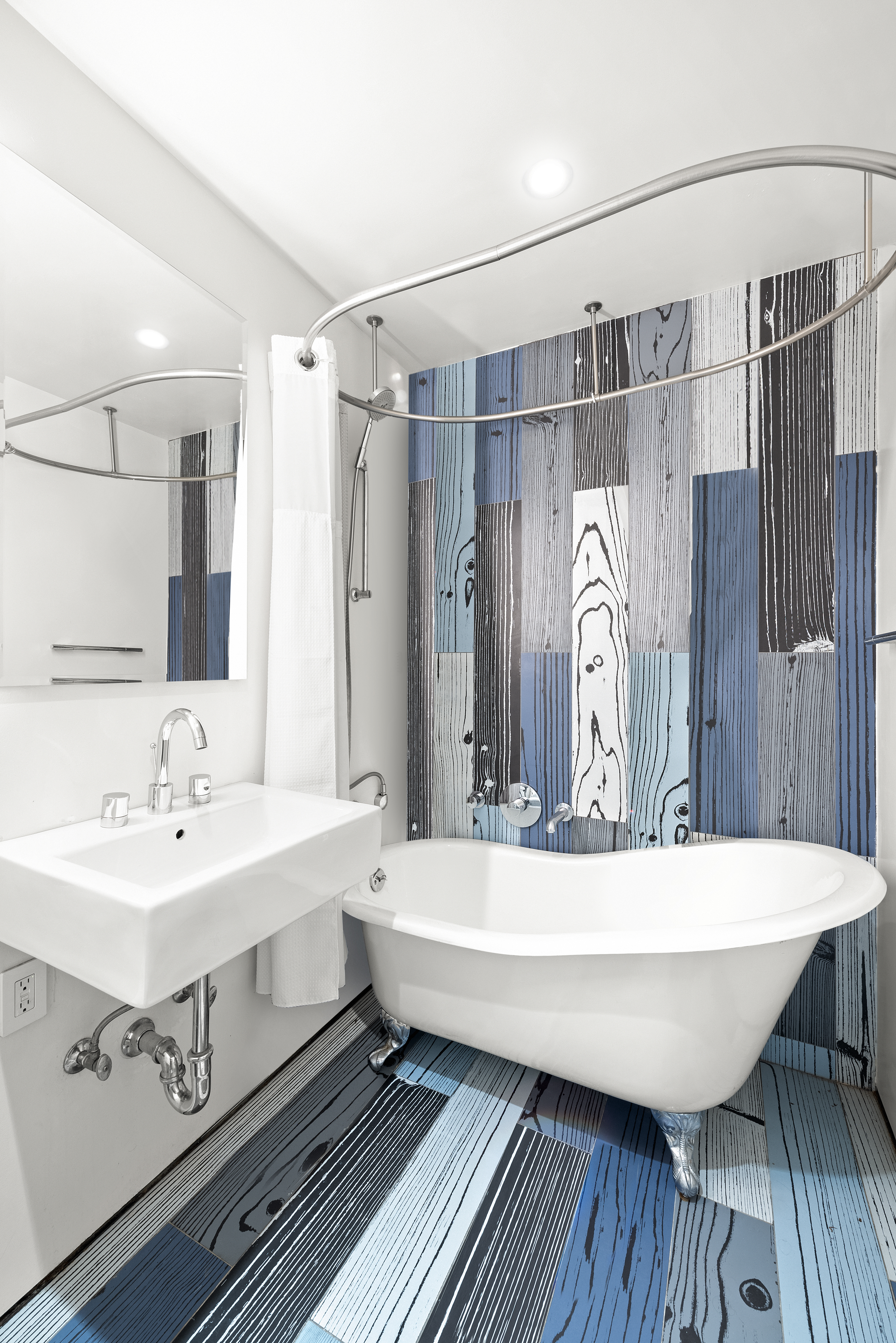 10 Bleecker Street, Unit 1B Manhattan, NY 10012 - Photo 12 of 16 a bathroom with a sink mirror and tub