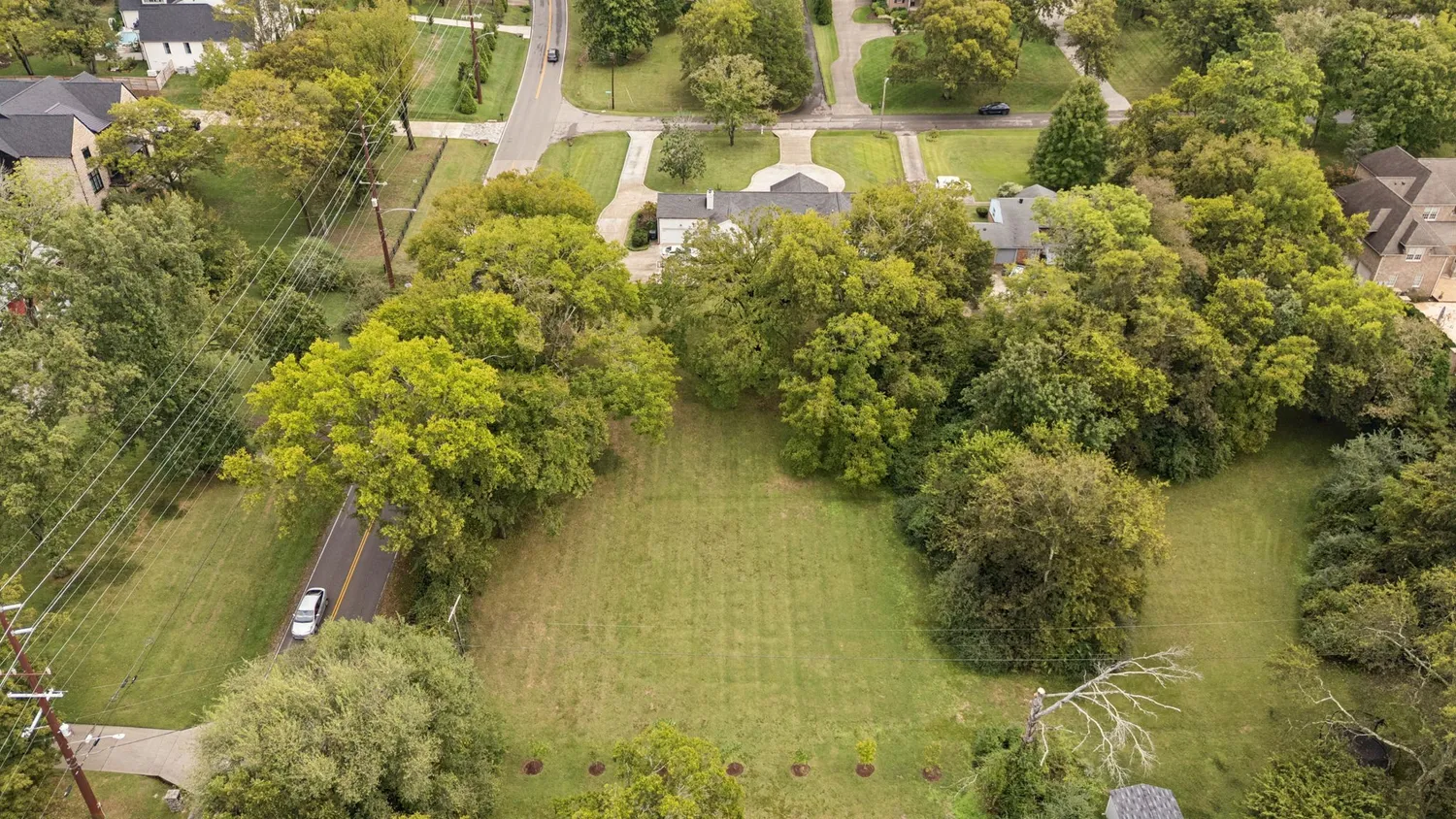 an aerial view of a swimming pool