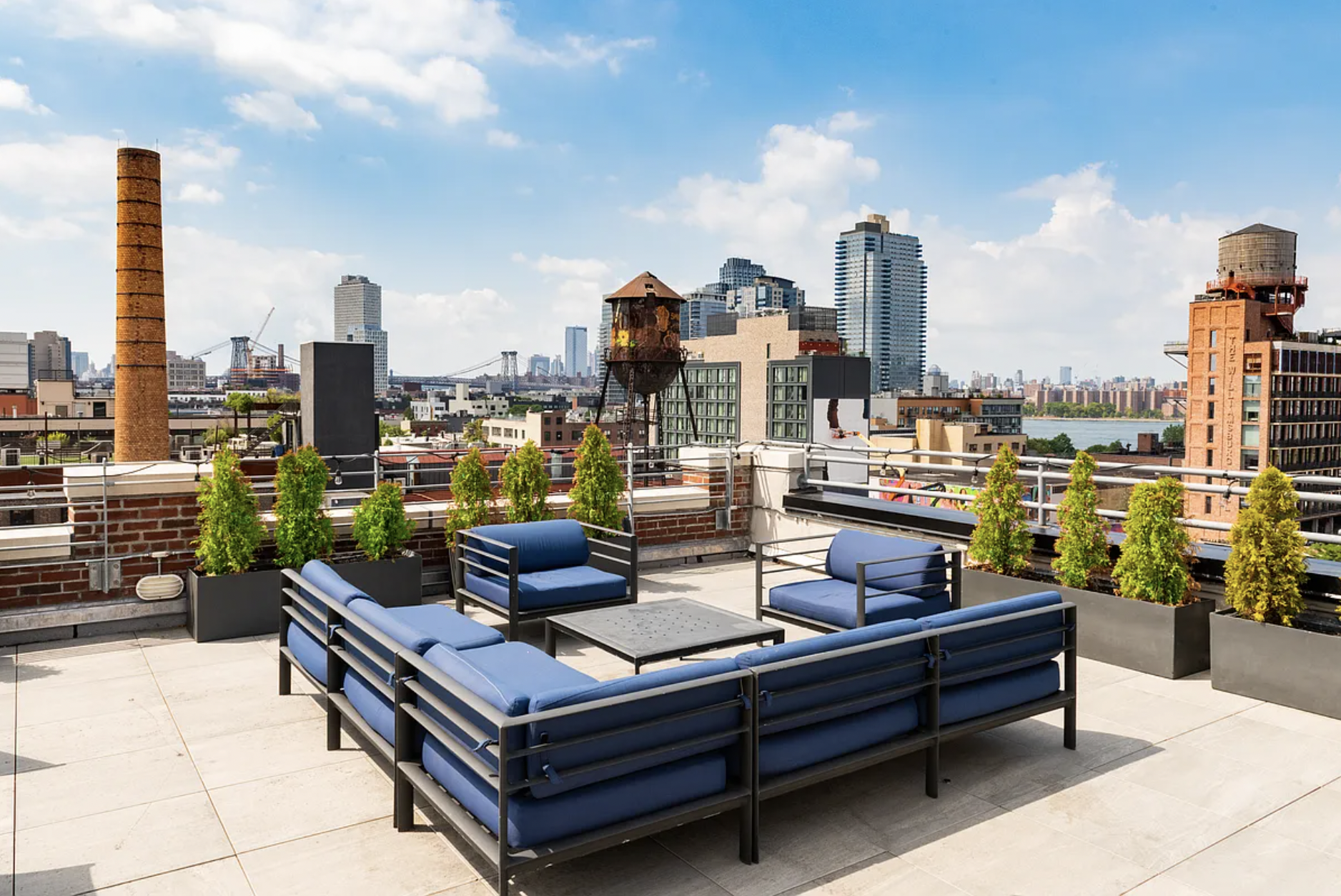 44 Berry Street, Unit 5E Brooklyn, NY 11249 - Photo 8 of 9 a couch on the terrace