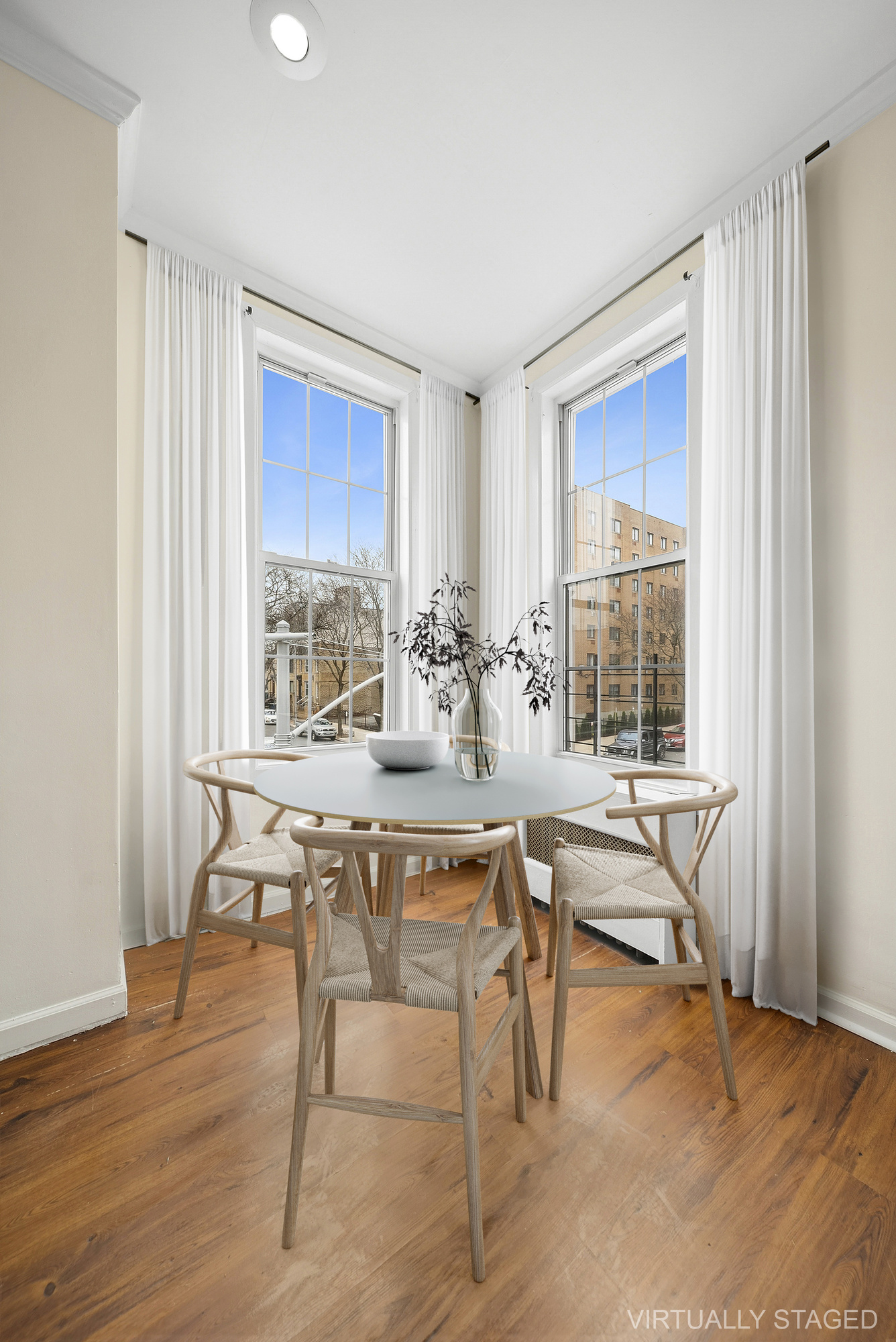 109 Moffat Street, Unit 2F Brooklyn, NY 11207 - Photo 5 of 8 a view of a dining room with furniture window and outside view