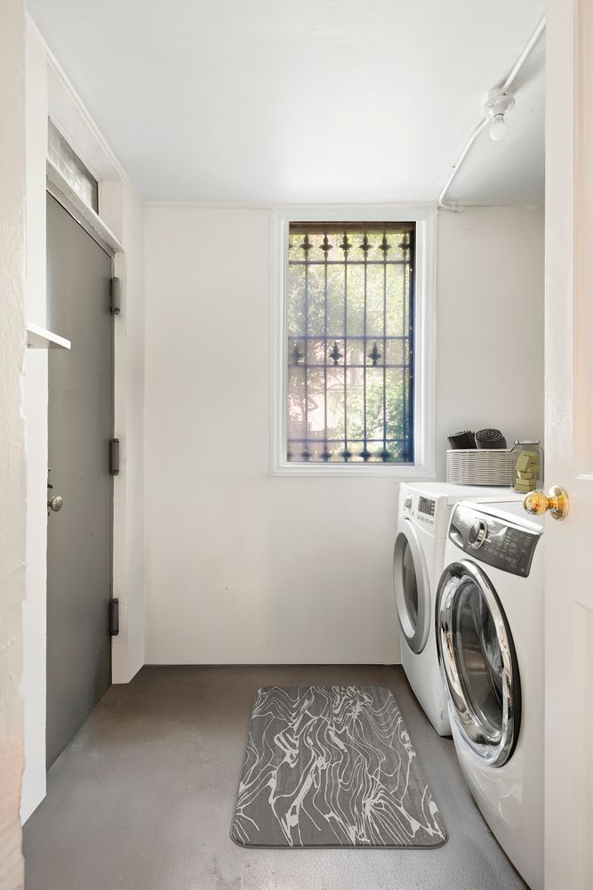 a view of entryway with washer and dryer