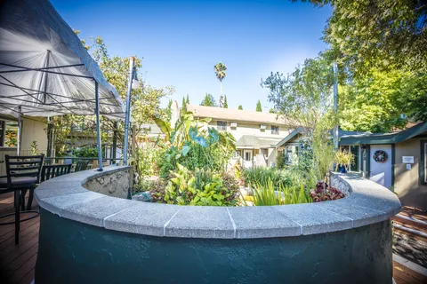 a bedroom with furniture and a couch