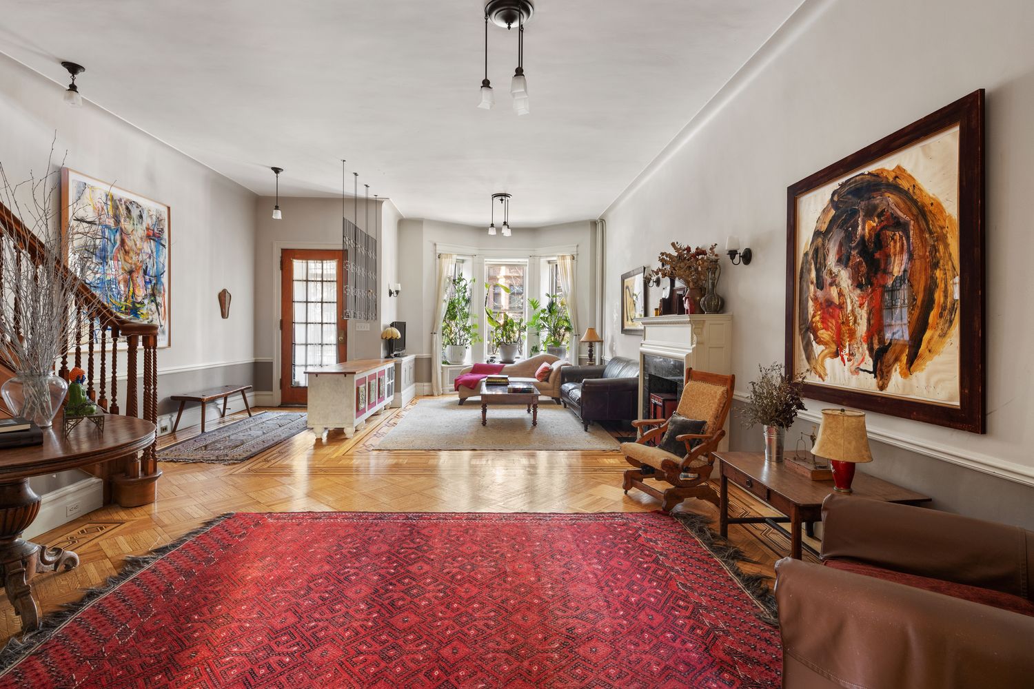 a very nice looking living room with a large window