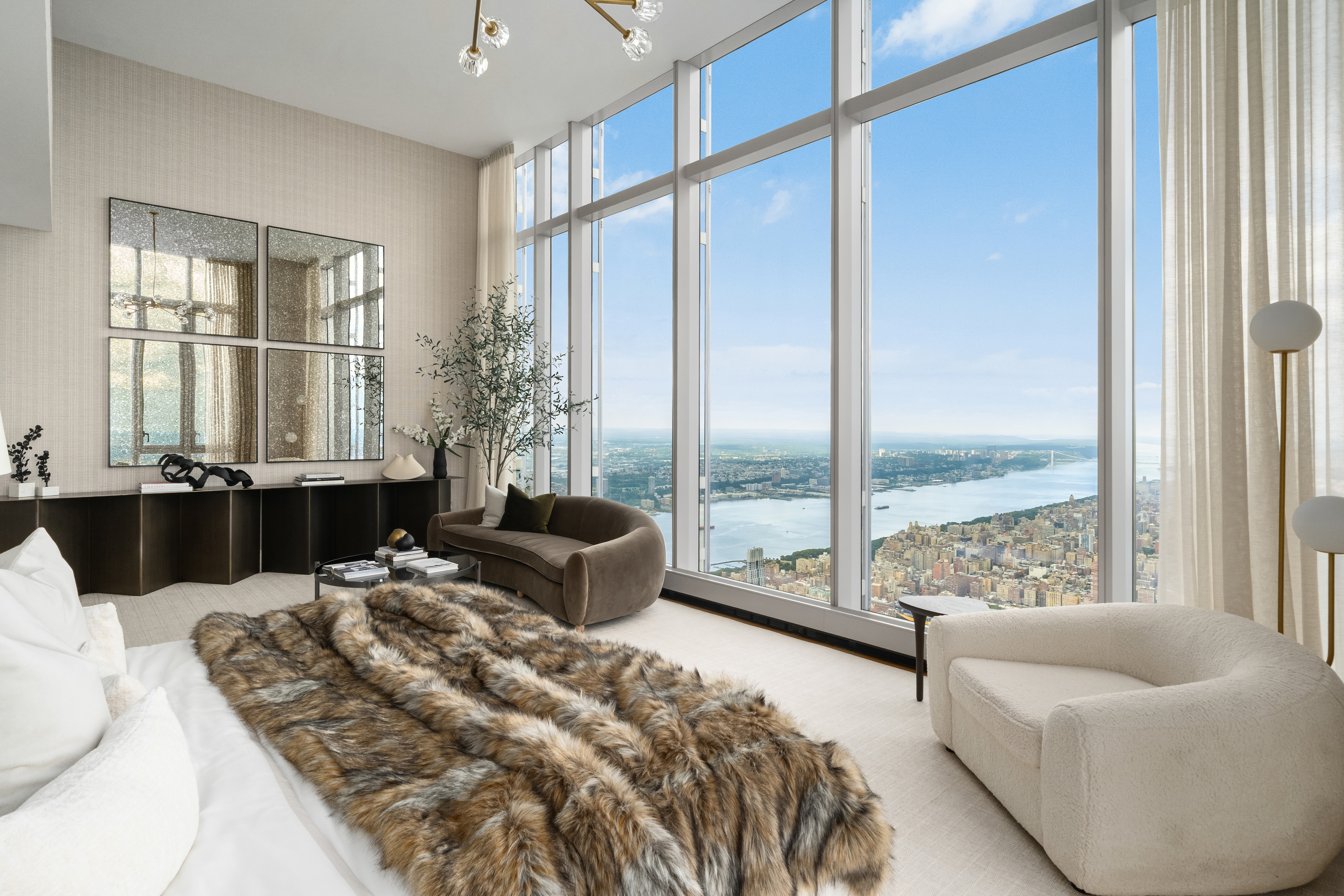 217 West 57th Street, Unit 127/128 Manhattan, NY 10019 - Photo 13 of 36 a living room with furniture and a large window