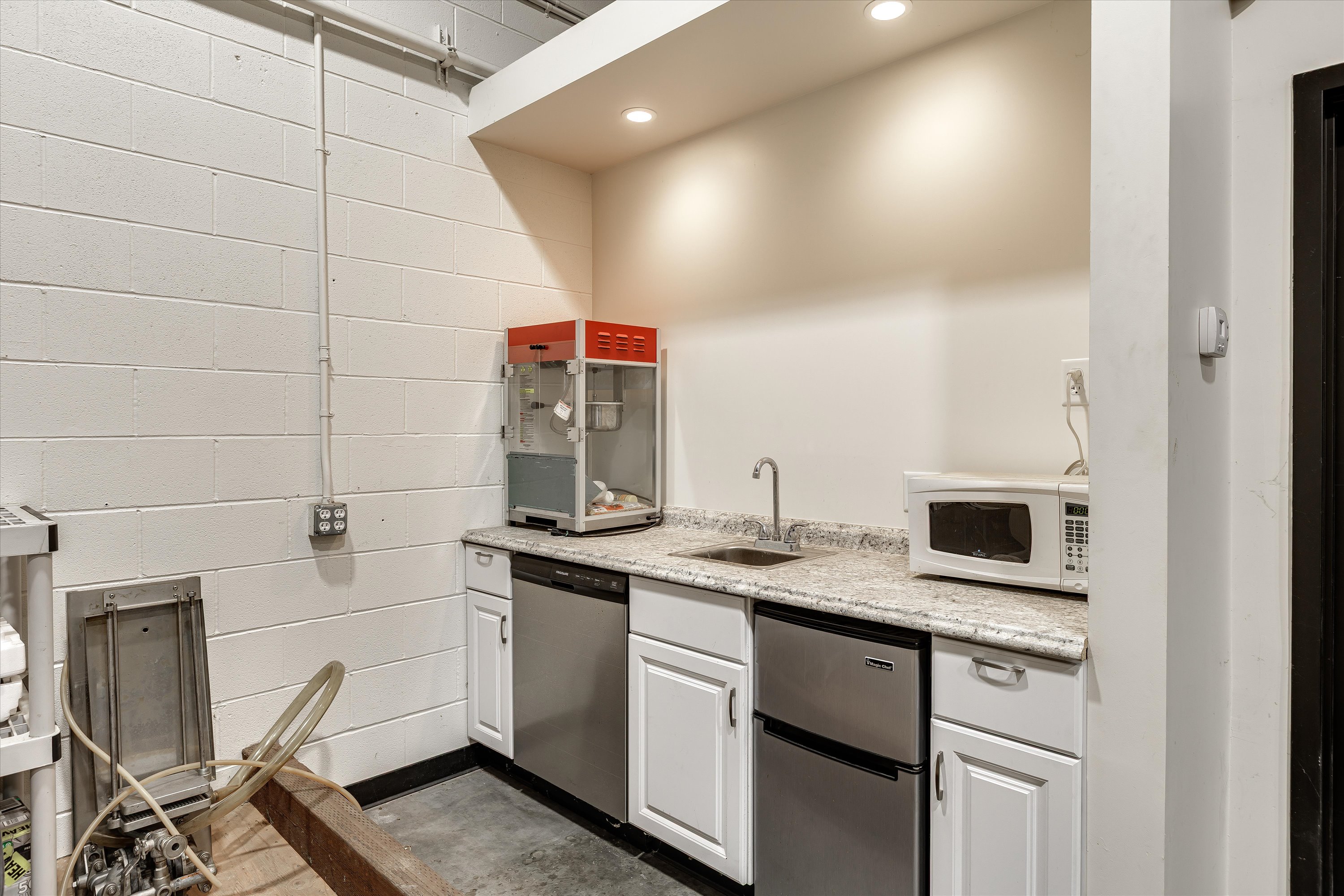 930 Huber Street, Unit H Grover Beach, CA 93433 - Photo 4 of 18 a kitchen with a sink and cabinets