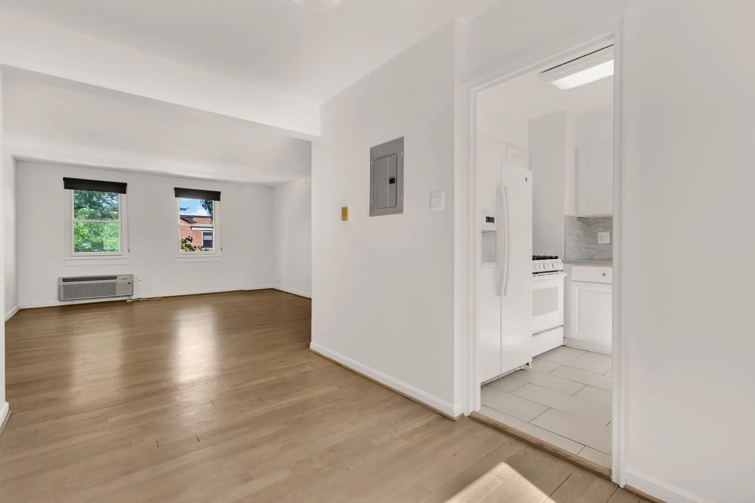 a view of a livingroom with wooden floor