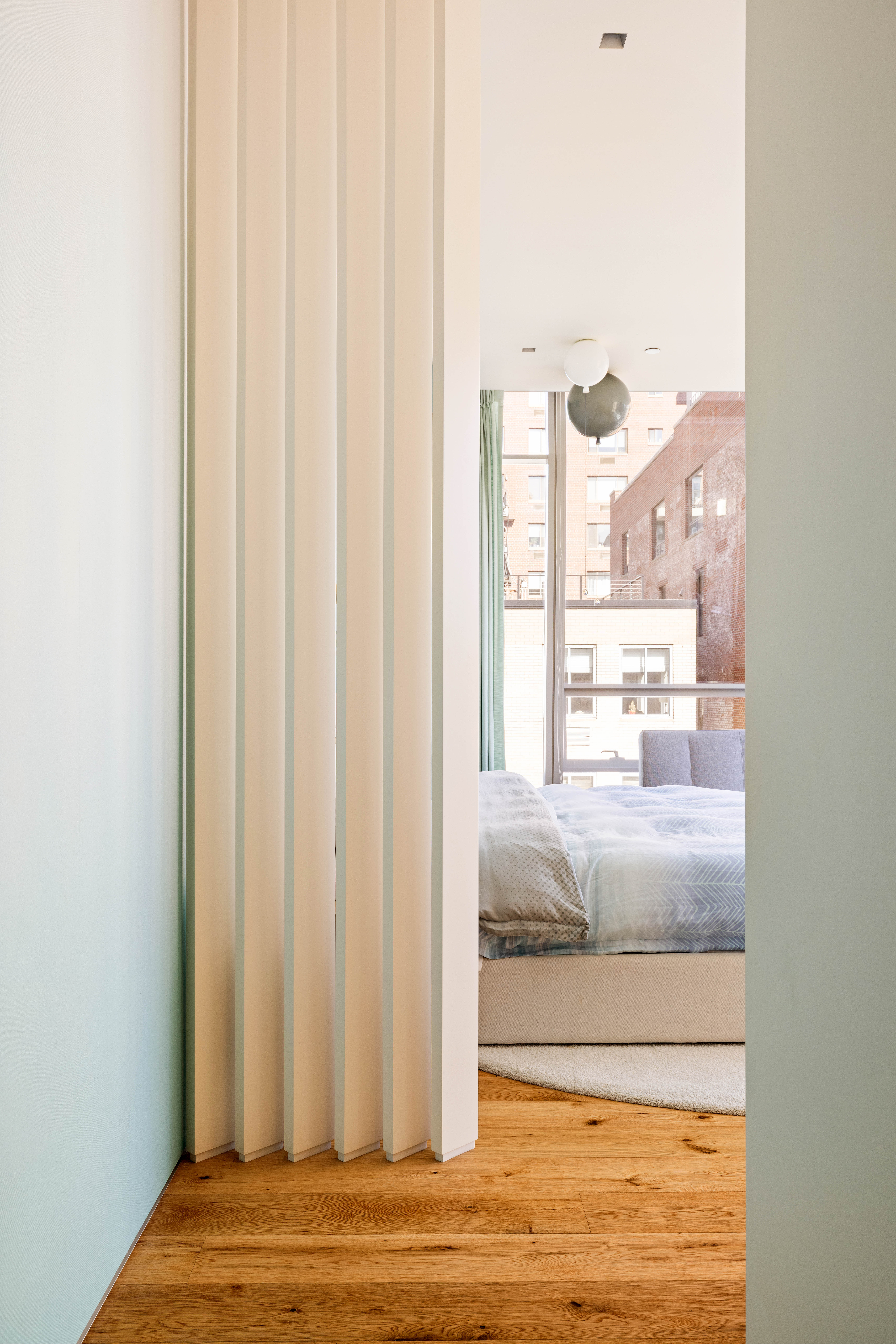 166 Perry Street, Unit 5A Manhattan, NY 10014 - Photo 9 of 25 a view of a bathroom from a window