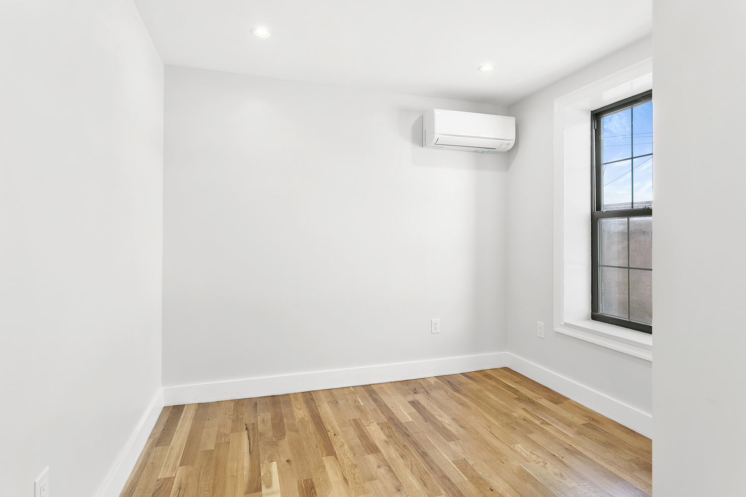 276 3rd Avenue, Unit 4A Brooklyn, NY 11215 - Photo 4 of 6 wooden floor in an empty room