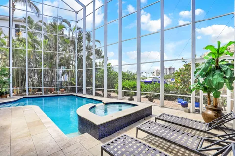 a view of a white building with a outdoor space