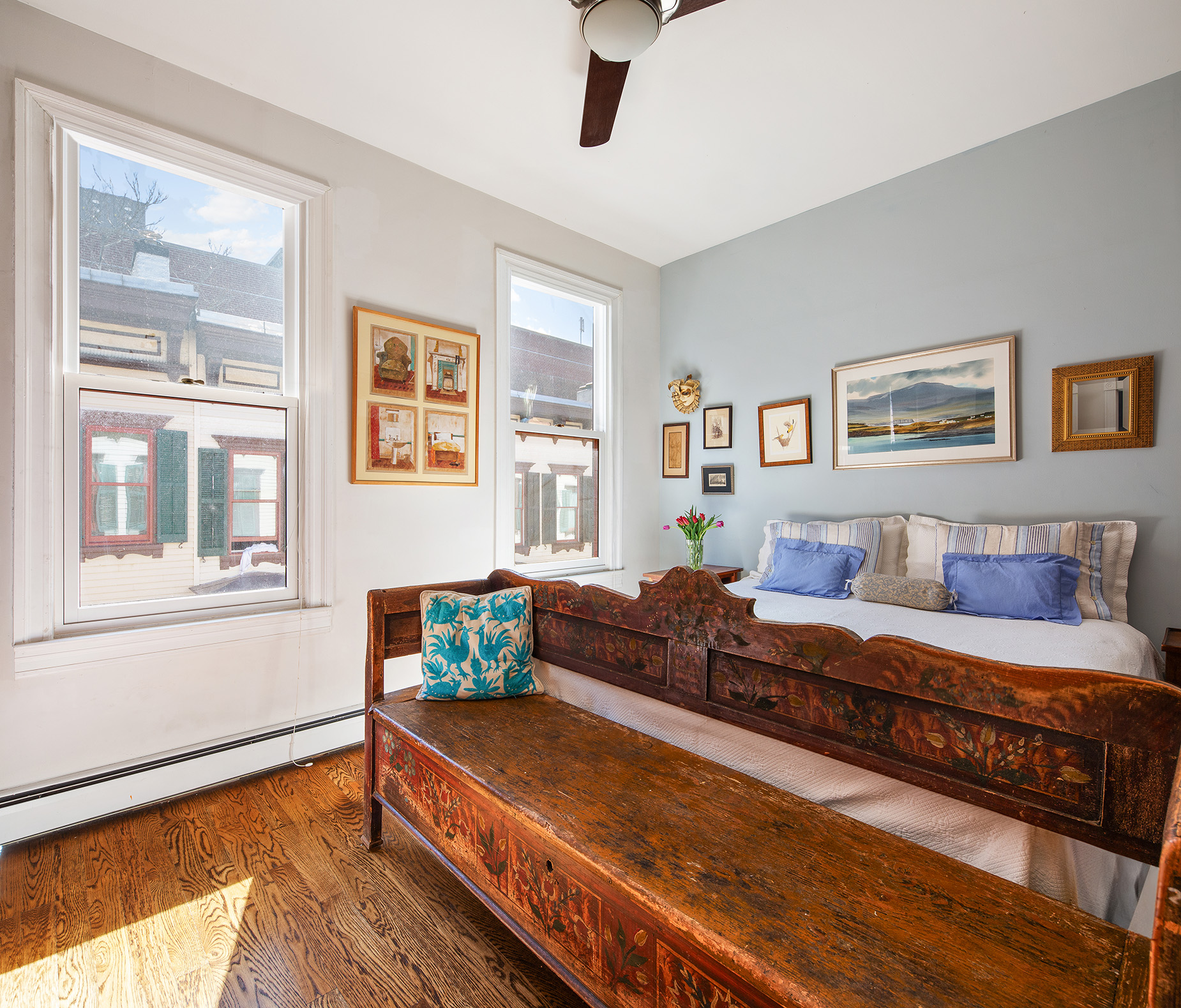 11 Sylvan Terrace Manhattan, NY 10032 - Photo 10 of 16 a bedroom with a bed and wooden floor