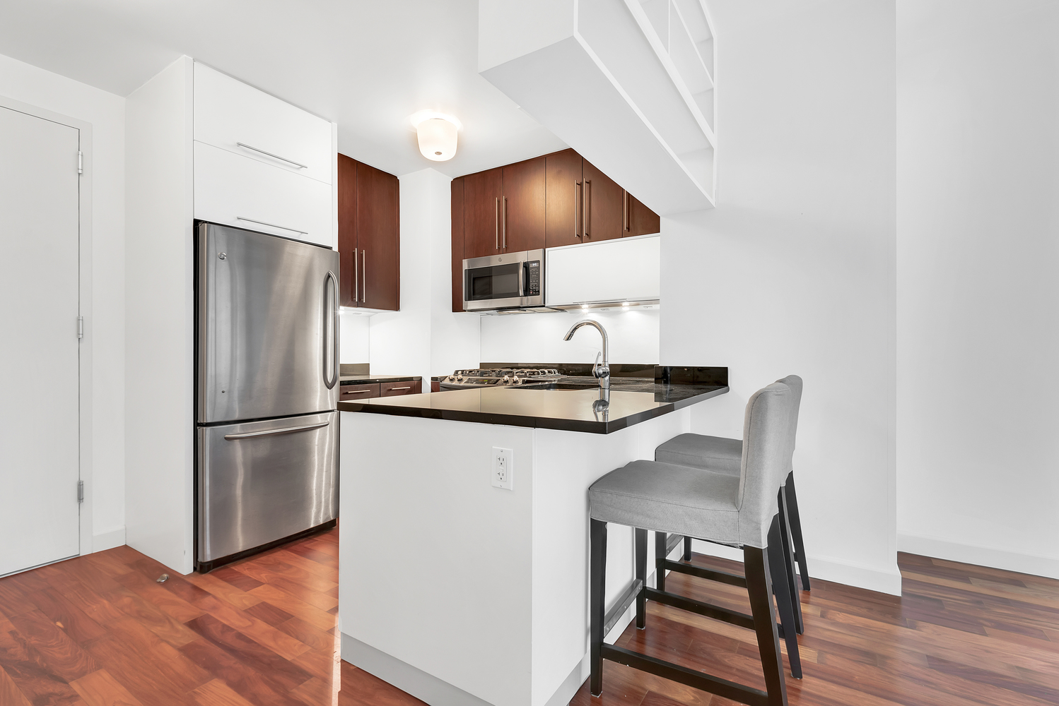 100 Jay Street, Unit 5D Brooklyn, NY 11201 - Photo 4 of 10 a kitchen with a refrigerator and a sink