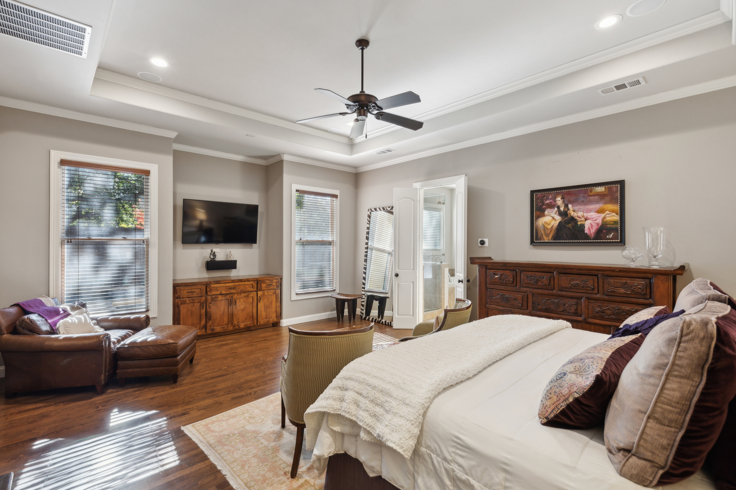 8411 Midway Road Dallas, TX 75209 - Photo 20 of 29 a bedroom with a bed couch and a window