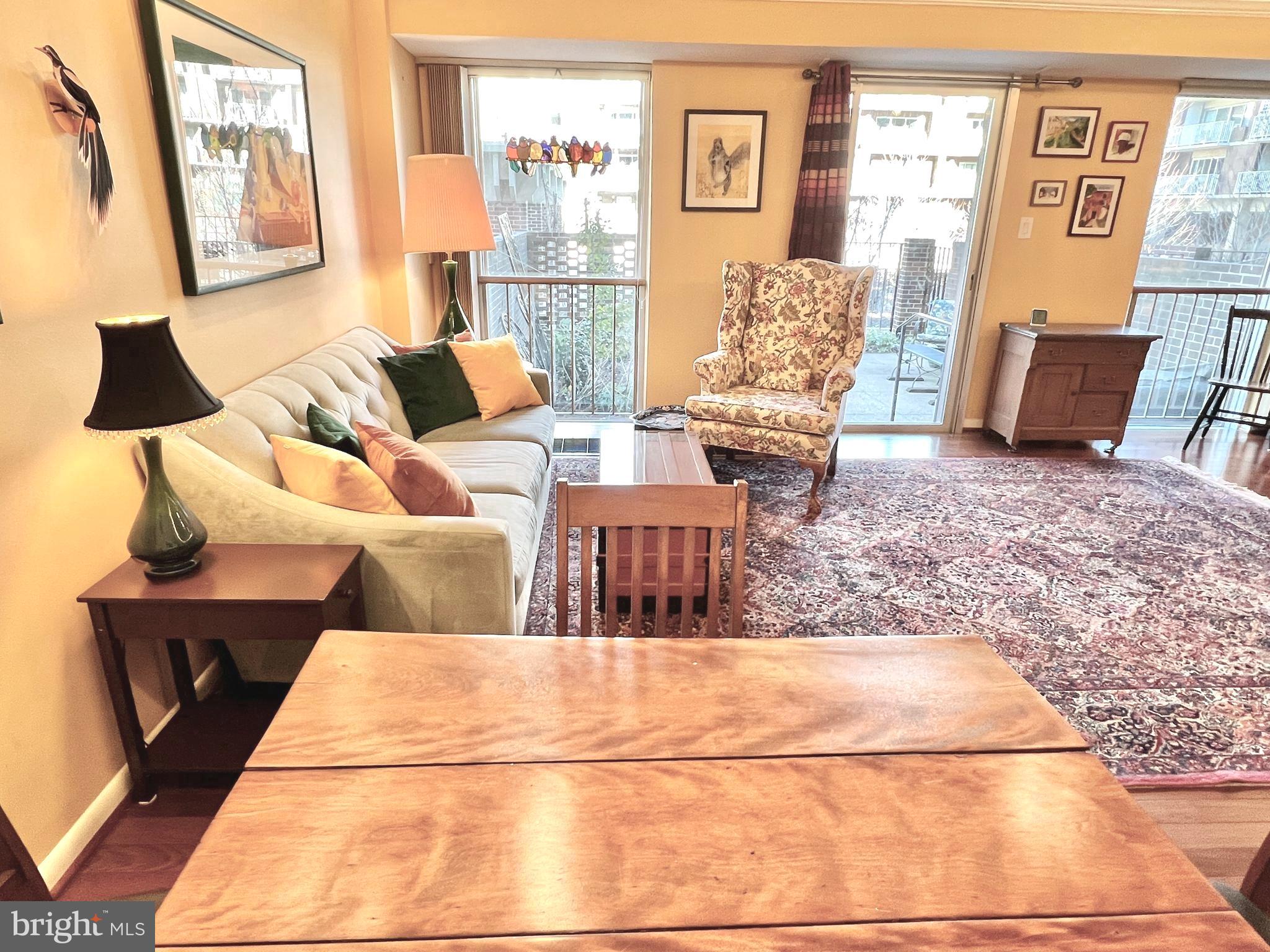520 N Street Southwest, Unit S112 Washington, DC 20024 - Photo 3 of 45 a living room with furniture and wooden floor