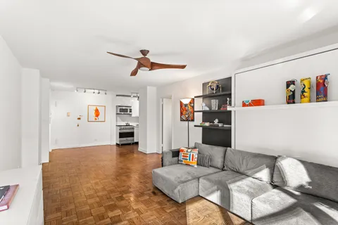 a living room with furniture and a couch
