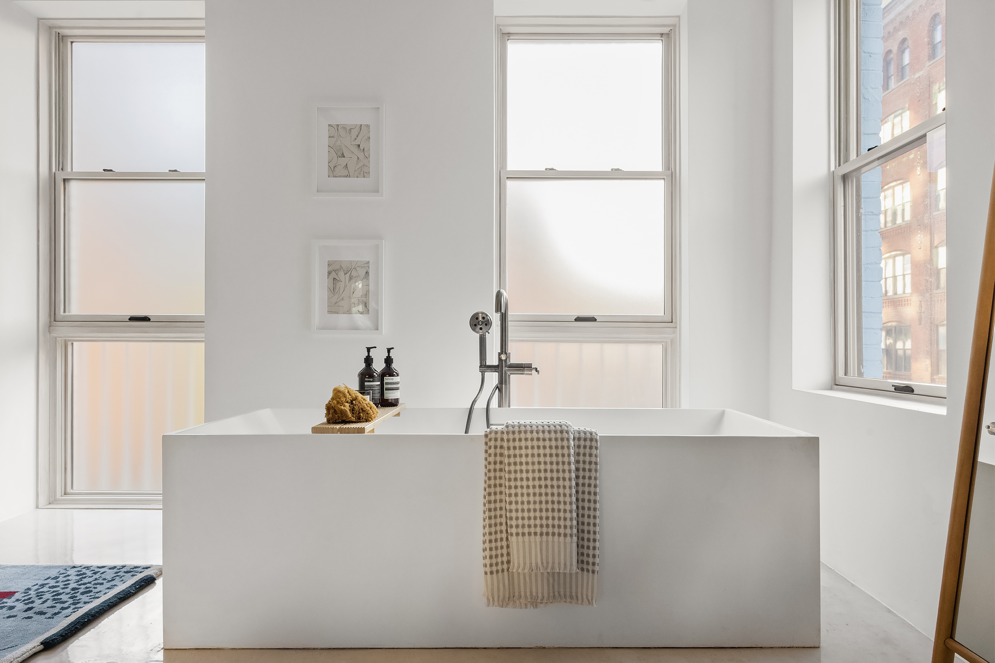 61 South 4th Street Brooklyn, NY 11249 - Photo 15 of 29 a bathroom with a sink and a mirror