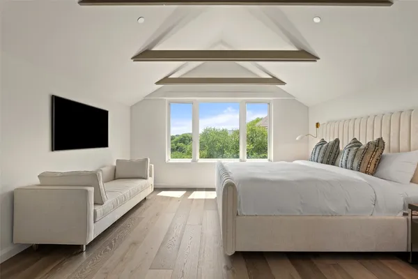 a living room with a couch and a flat screen tv