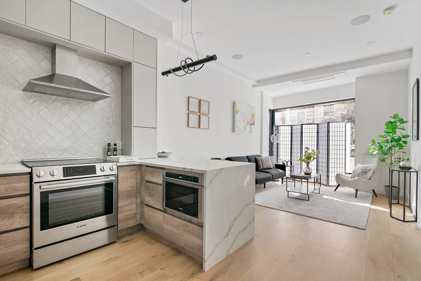 1251 Pacific Street, Unit 1 Brooklyn, NY 11216 - Photo 1 of 13 a kitchen with a stove and a white cabinets