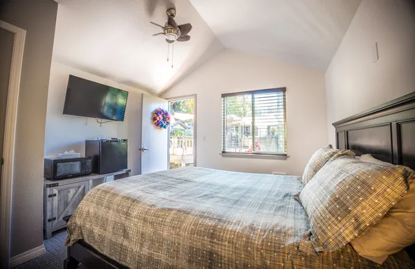 a view of a chairs and table in the balcony