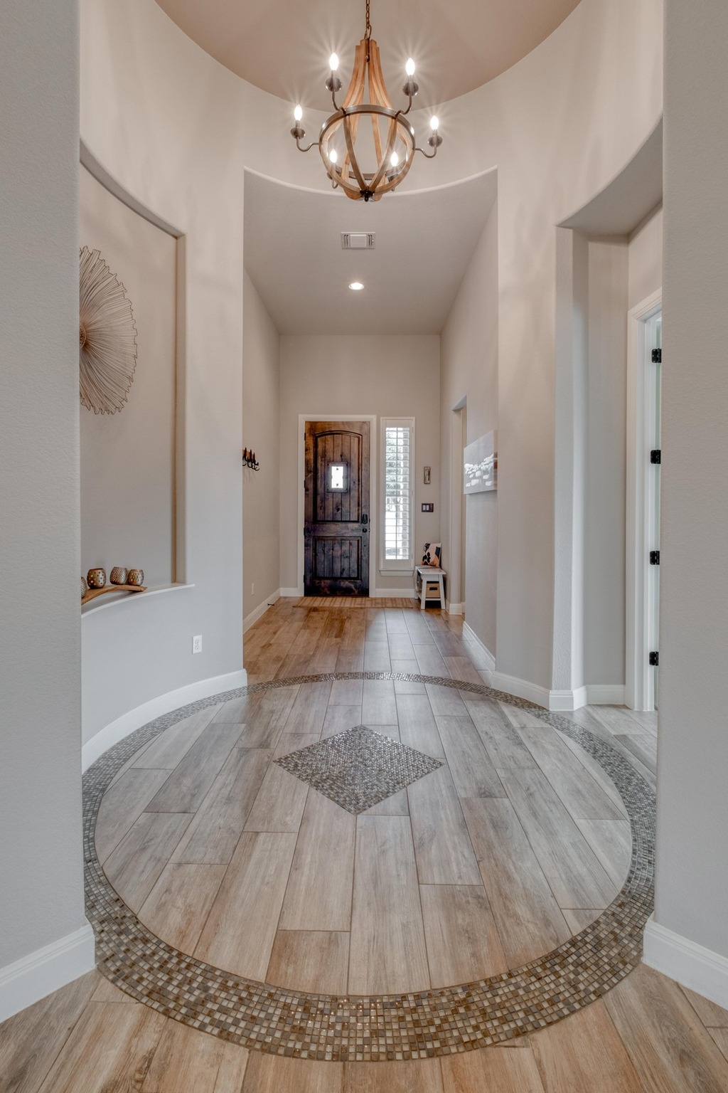 3836 Kyler Glen Road Round Rock, TX 78681 - Photo 5 of 41 a view of a livingroom with a furniture wooden floor and windows
