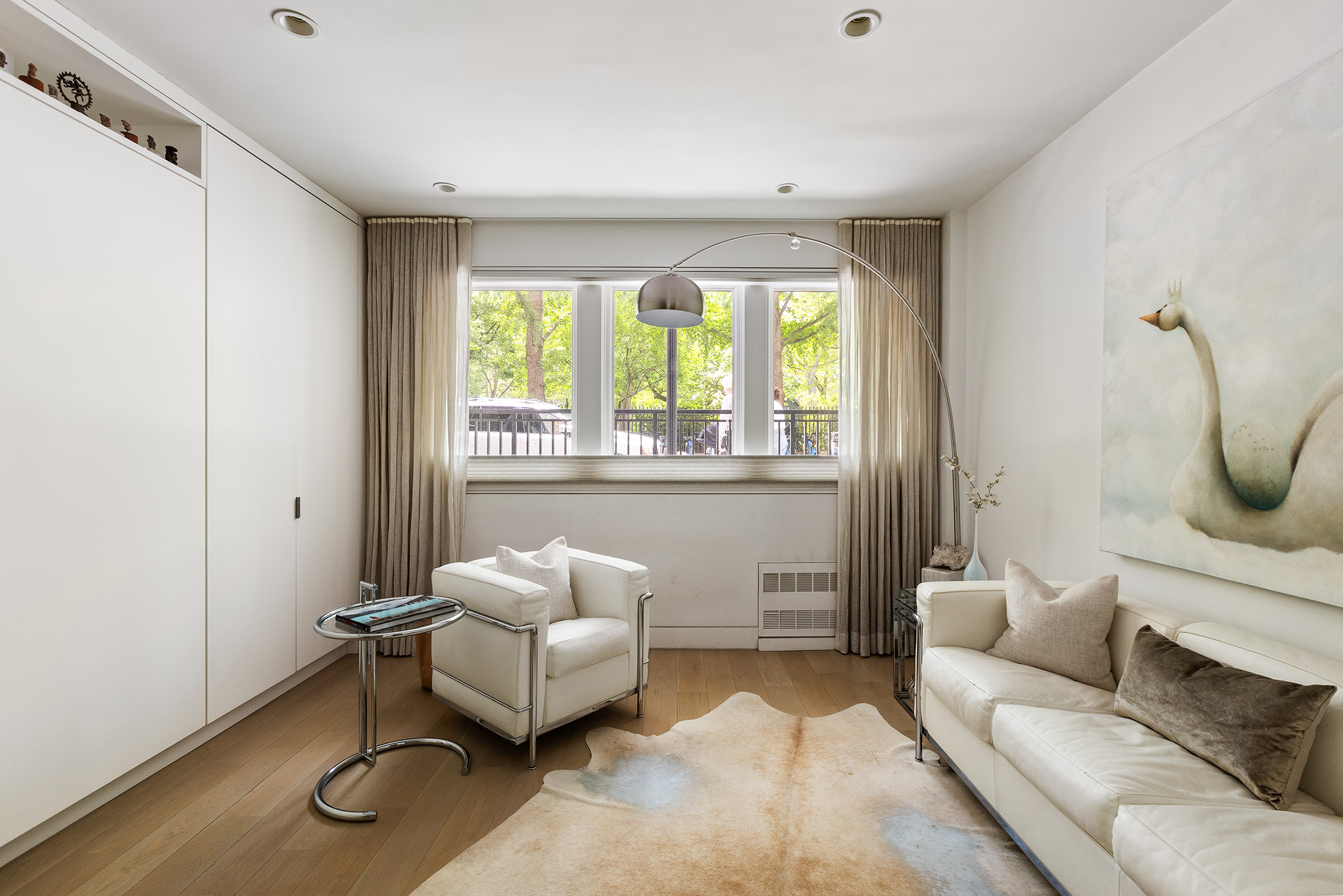 48 Gramercy Park North, Unit 1A Manhattan, NY 10010 - Photo 2 of 14 a living room with furniture and a large window