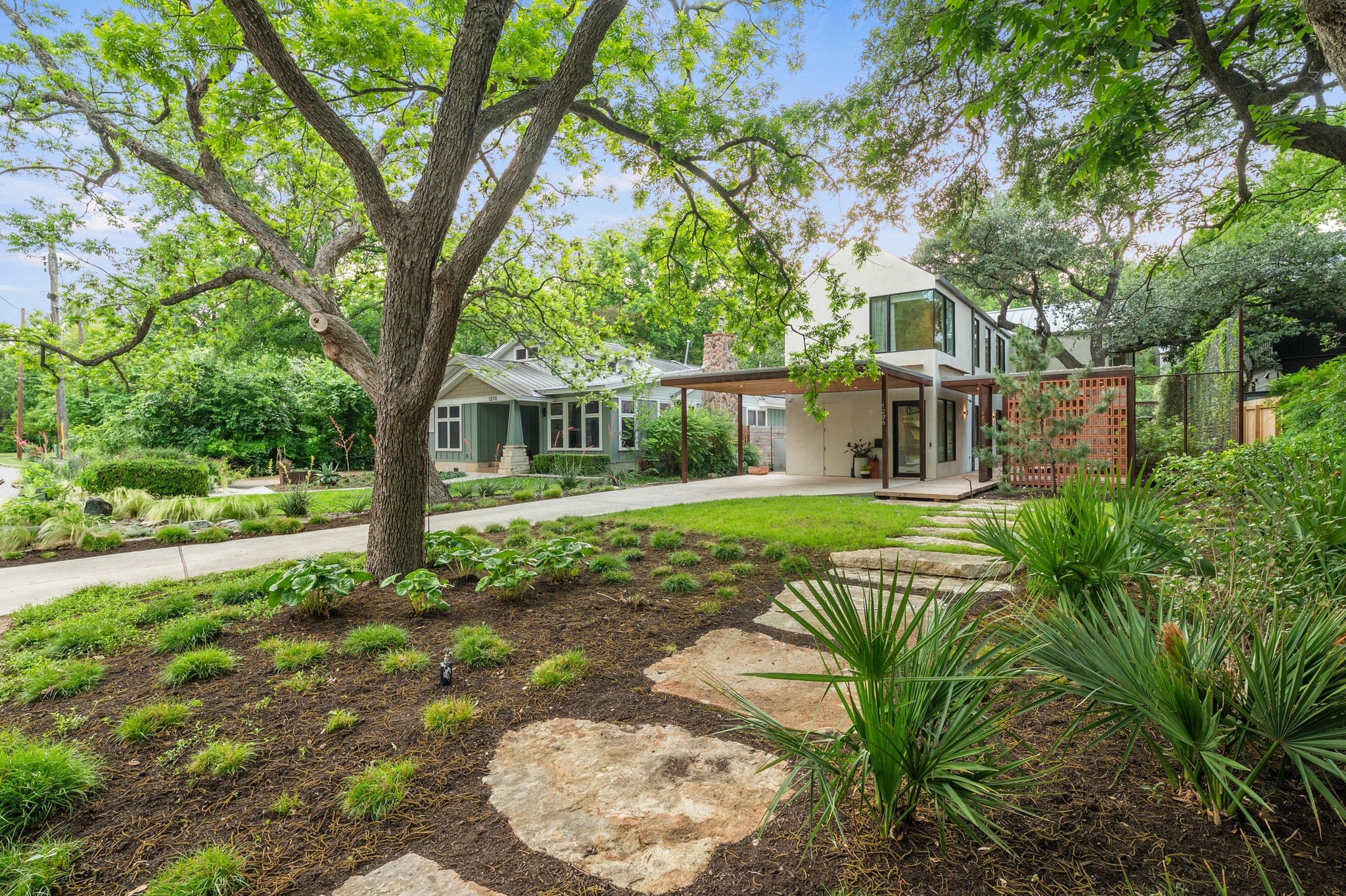 1206 Bickler Road Austin, TX 78704 - Photo 13 of 65 front view of a house with a yard
