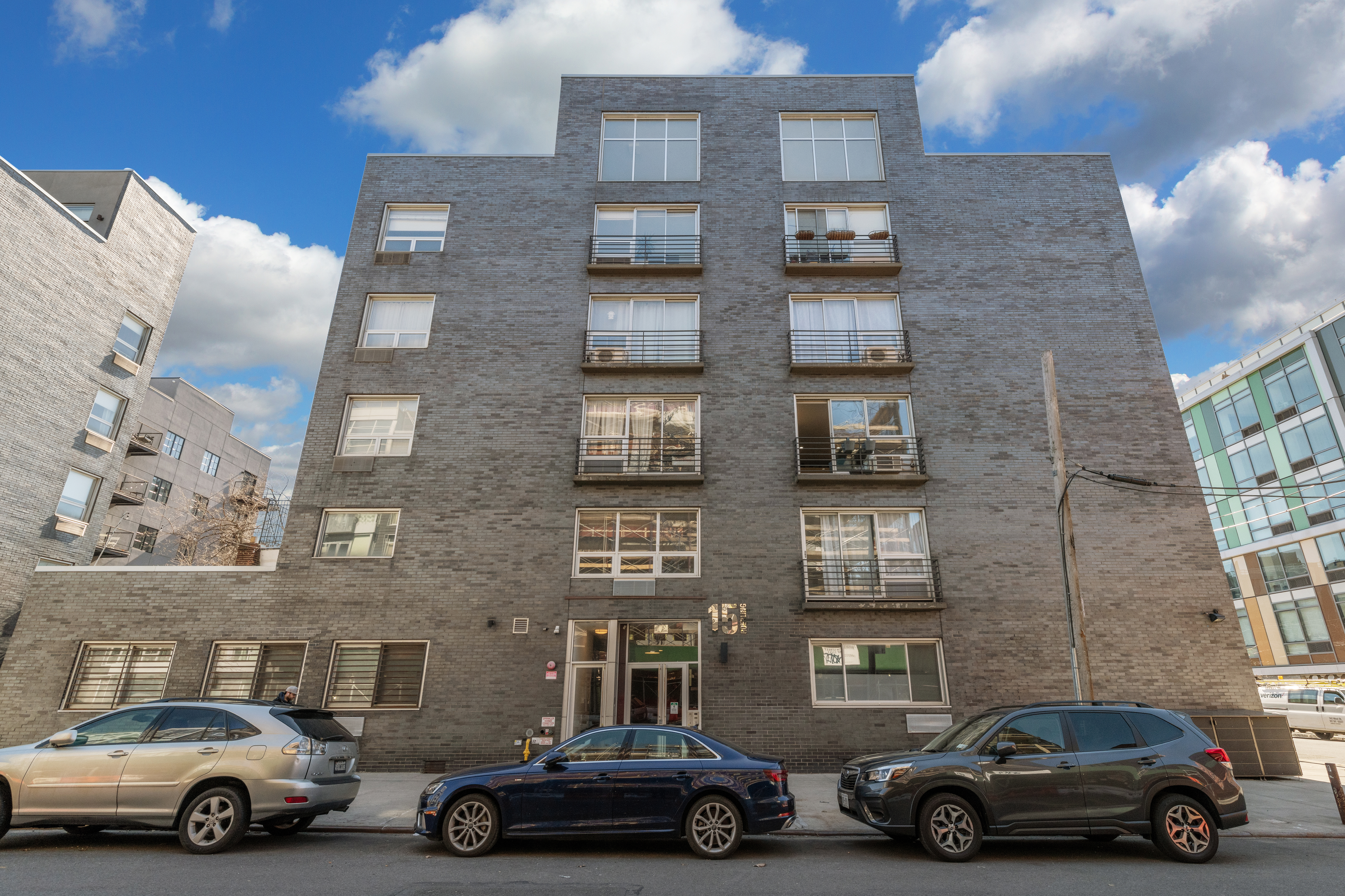 15 Roebling Street, Unit 2B Brooklyn, NY 11211 - Photo 8 of 9 a car parked in front of a building