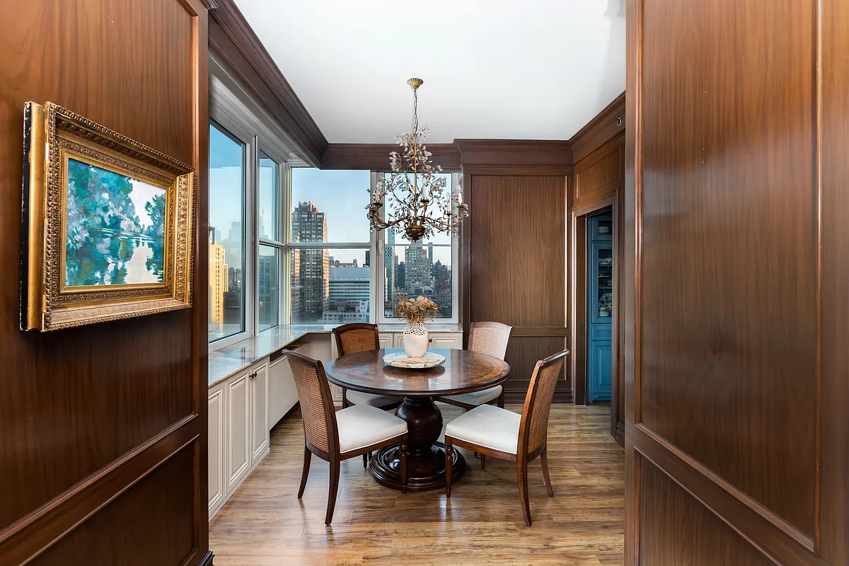 404 East 76th Street, Unit 30C Manhattan, NY 10021 - Photo 6 of 24 a dining room with furniture window and outside view
