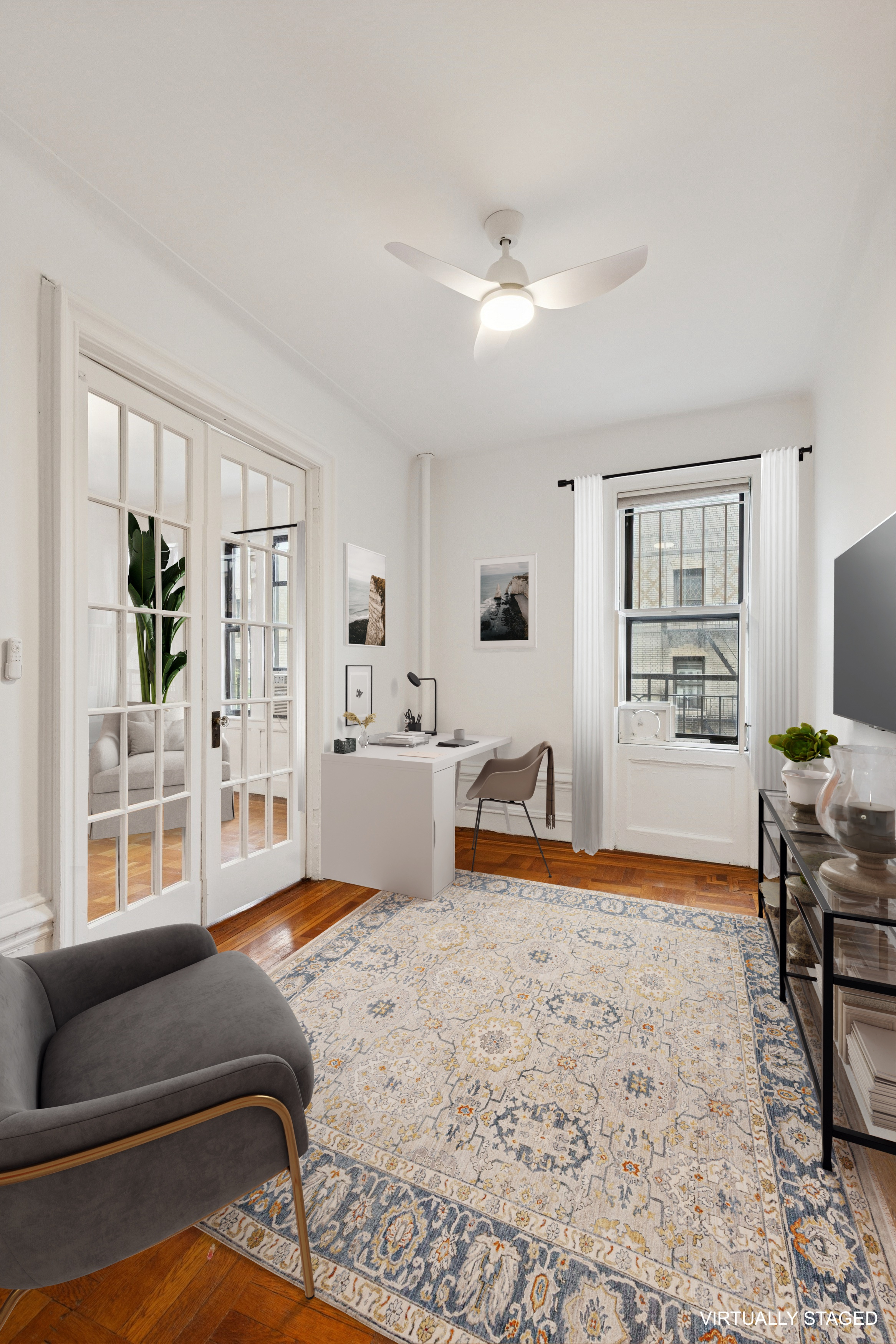 804 West 180th Street, Unit 41 Manhattan, NY 10033 - Photo 3 of 23 a bedroom with furniture and a window