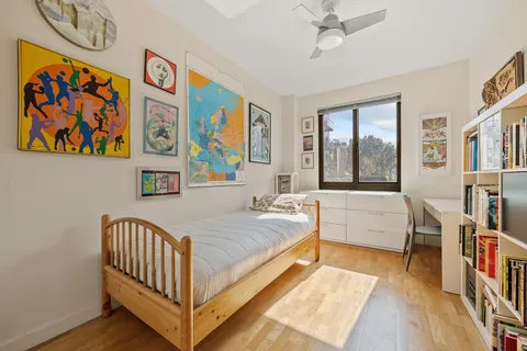 a bed room with a bed and a couch