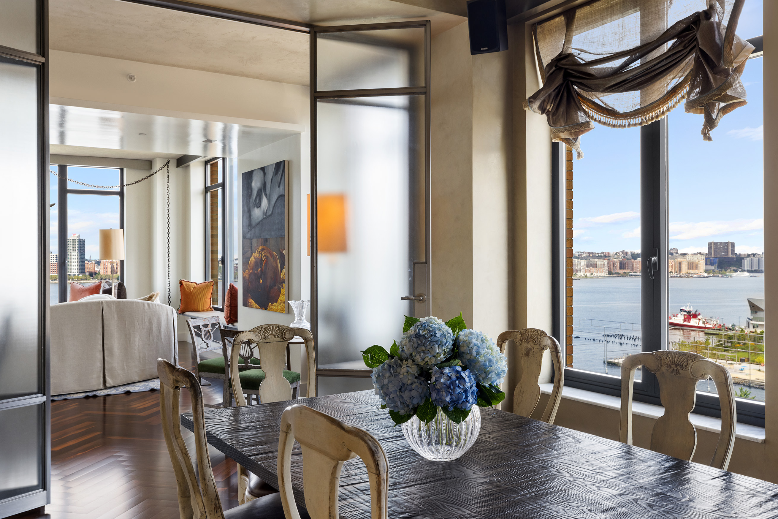 400 West 12th Street, Unit 12C Manhattan, NY 10014 - Photo 7 of 24 a living room with furniture