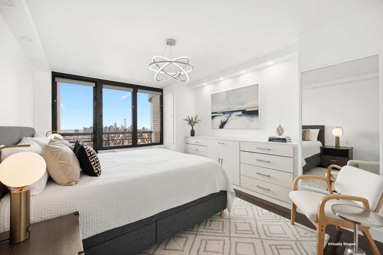 330 East 38th Street, Unit PHB Manhattan, NY 10016 - Photo 5 of 11 a bedroom with a bed and window
