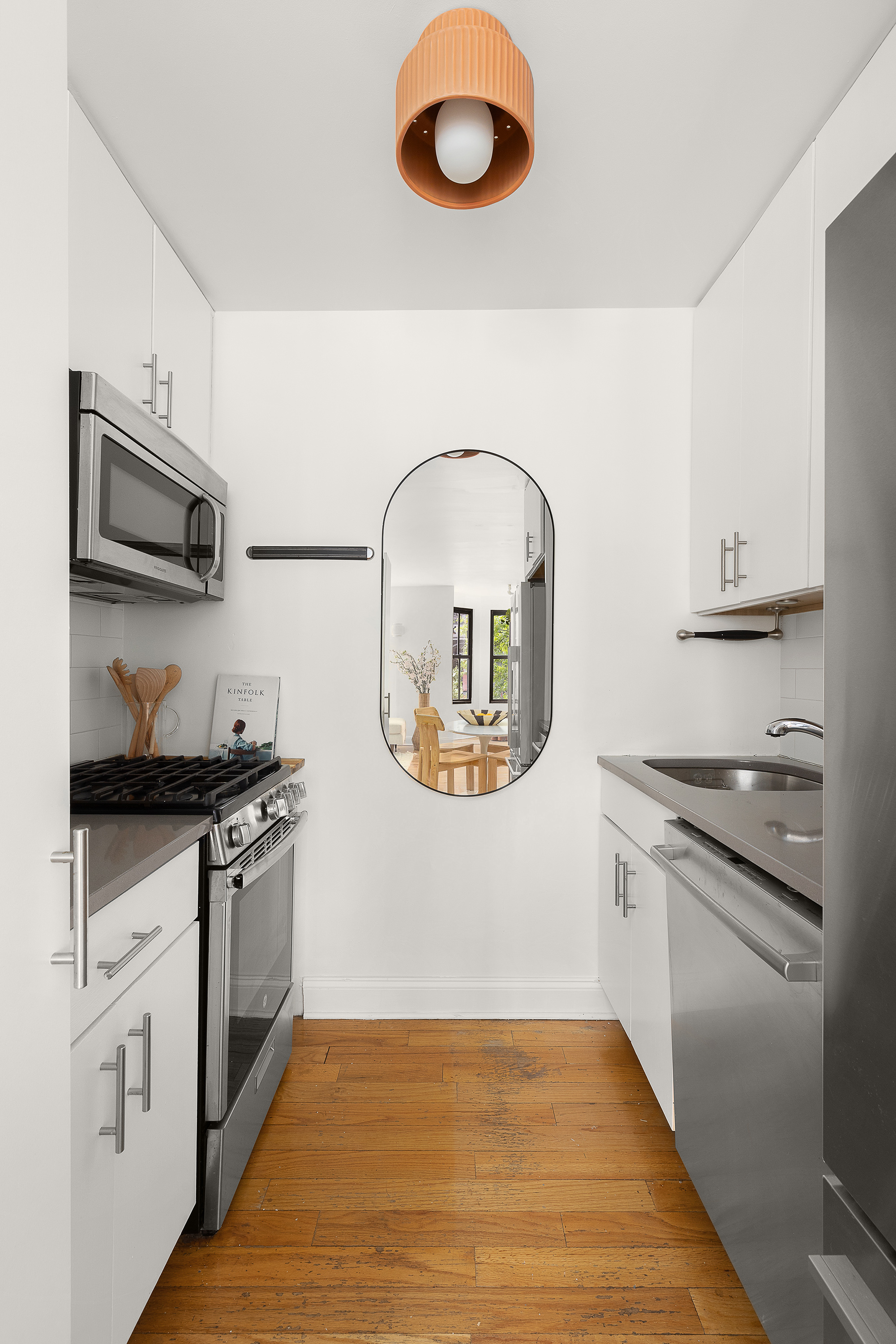 138 Baltic Street, Unit 4C Brooklyn, NY 11201 - Photo 4 of 12 a kitchen with stainless steel appliances granite countertop a stove and a sink