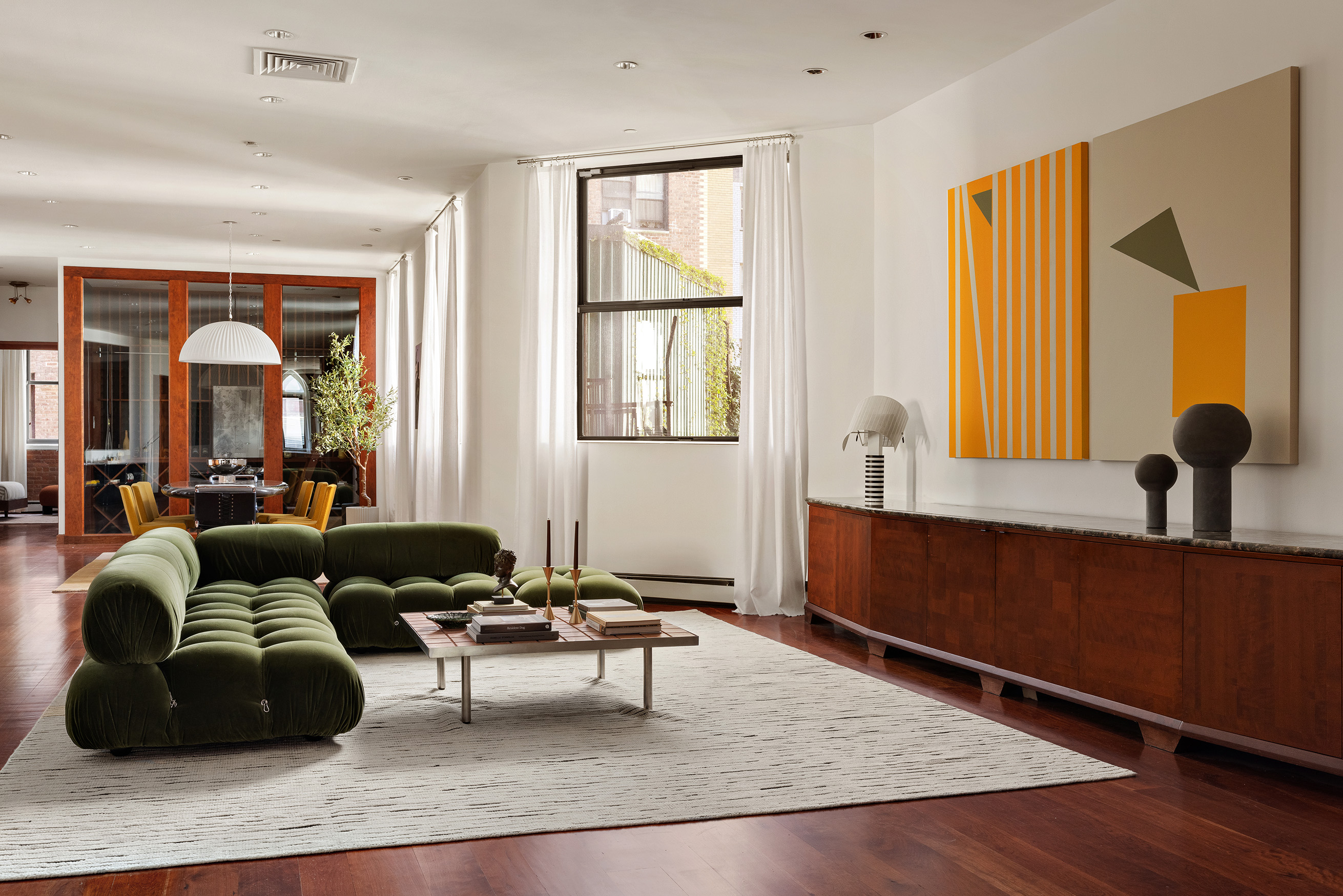 40 West 13th Street, Unit 2 Manhattan, NY 10011 - Photo 2 of 14 a living room with furniture and a window