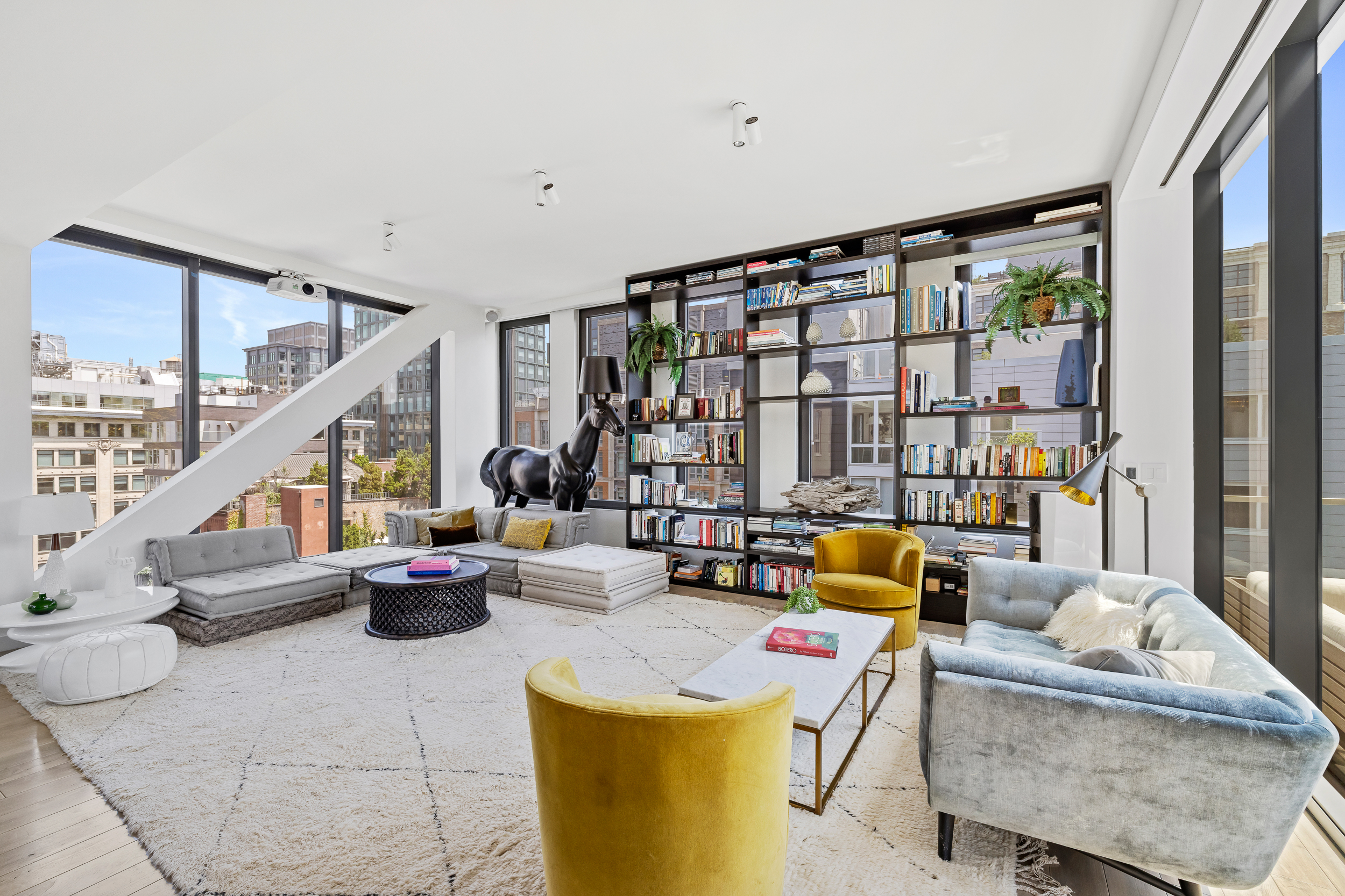 15 Renwick Street, Unit PH2 Manhattan, NY 10013 - Photo 3 of 23 a living room with furniture and floor to ceiling windows