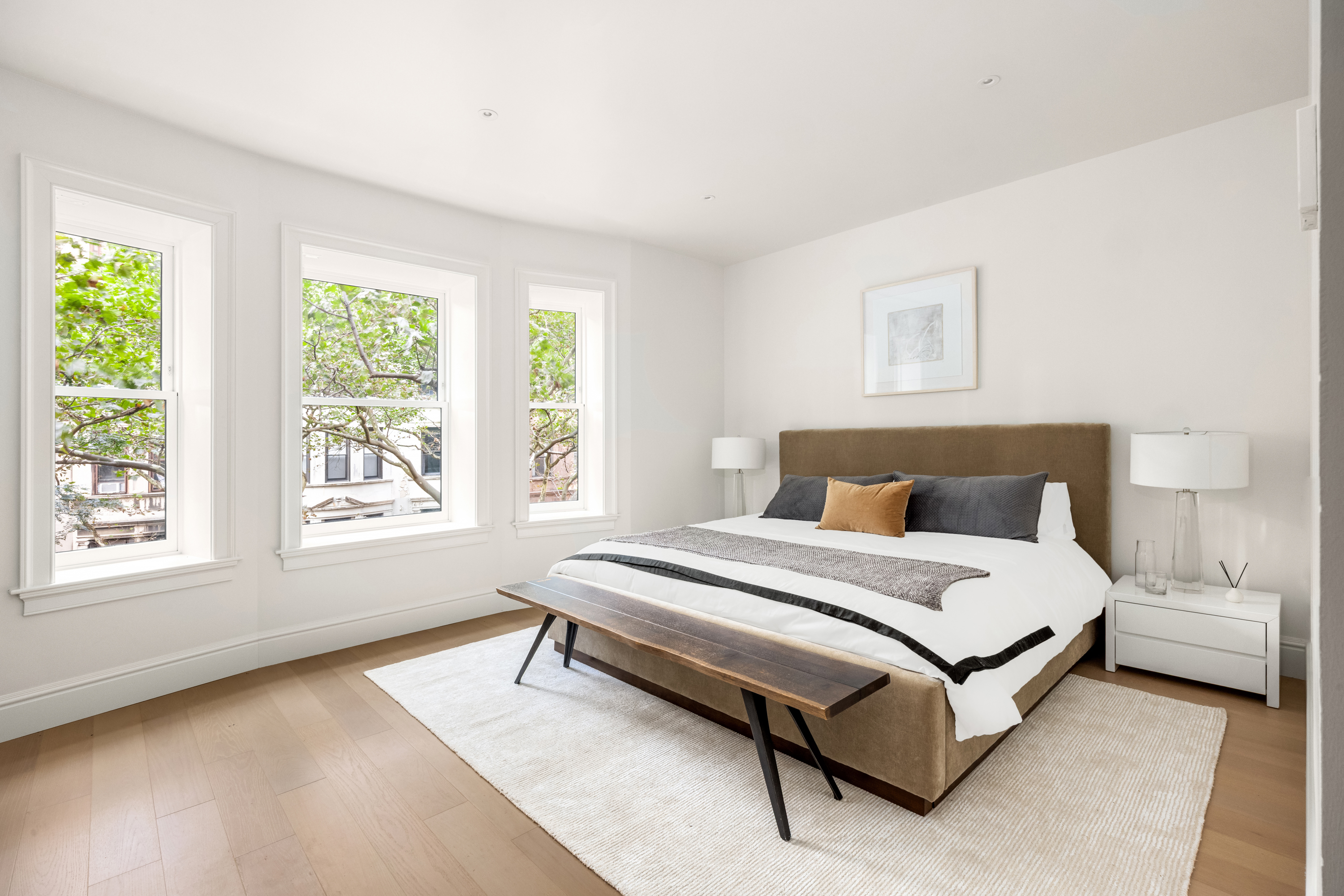 344 West 84th Street, Unit PH Manhattan, NY 10024 - Photo 9 of 19 a spacious bedroom with a bed and a window