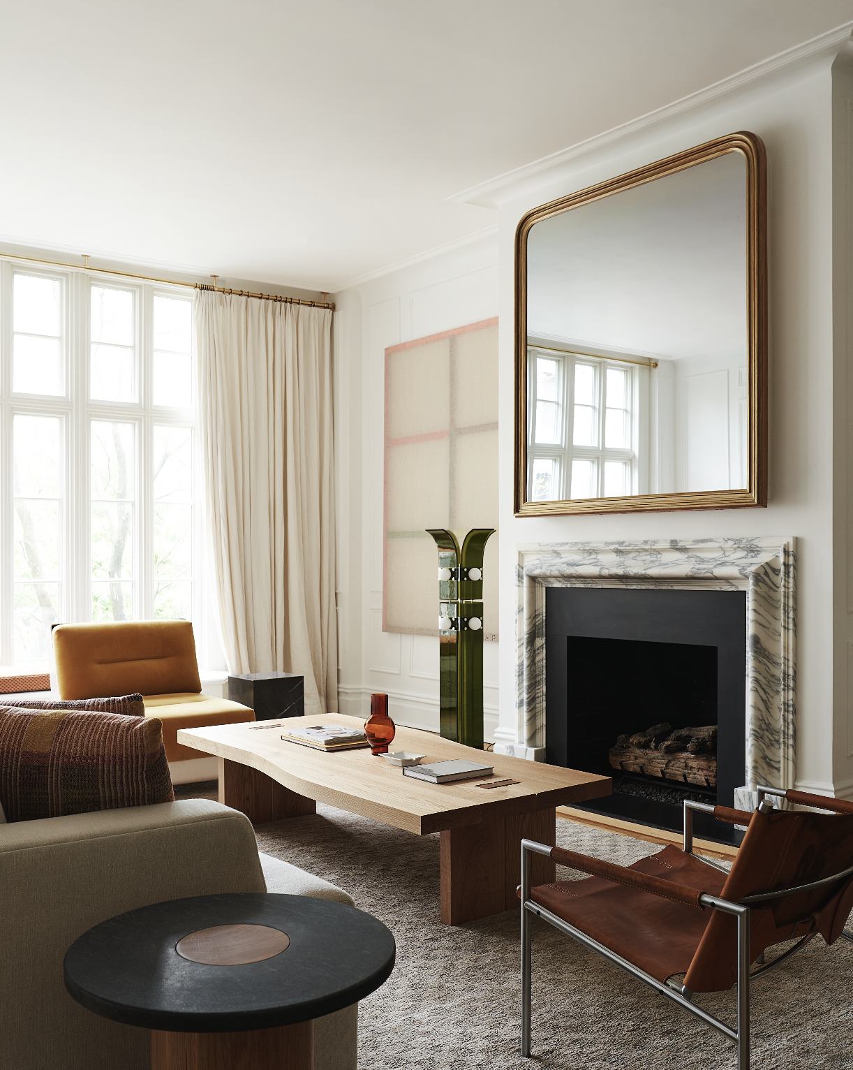 13 Gramercy Park South Manhattan, NY 10003 - Photo 3 of 13 a living room with furniture and a fireplace