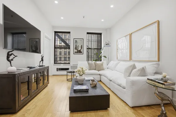 a living room with furniture and a couch