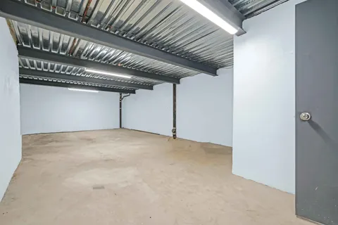 a view of a living room with furniture