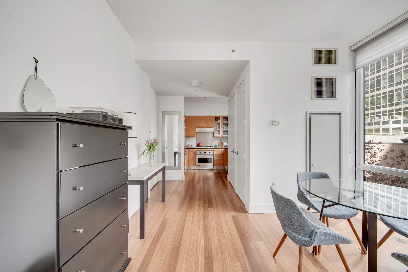 10 West End Avenue, Unit 4J Manhattan, NY 10023 - Photo 7 of 15 a view of a living room and dining room
