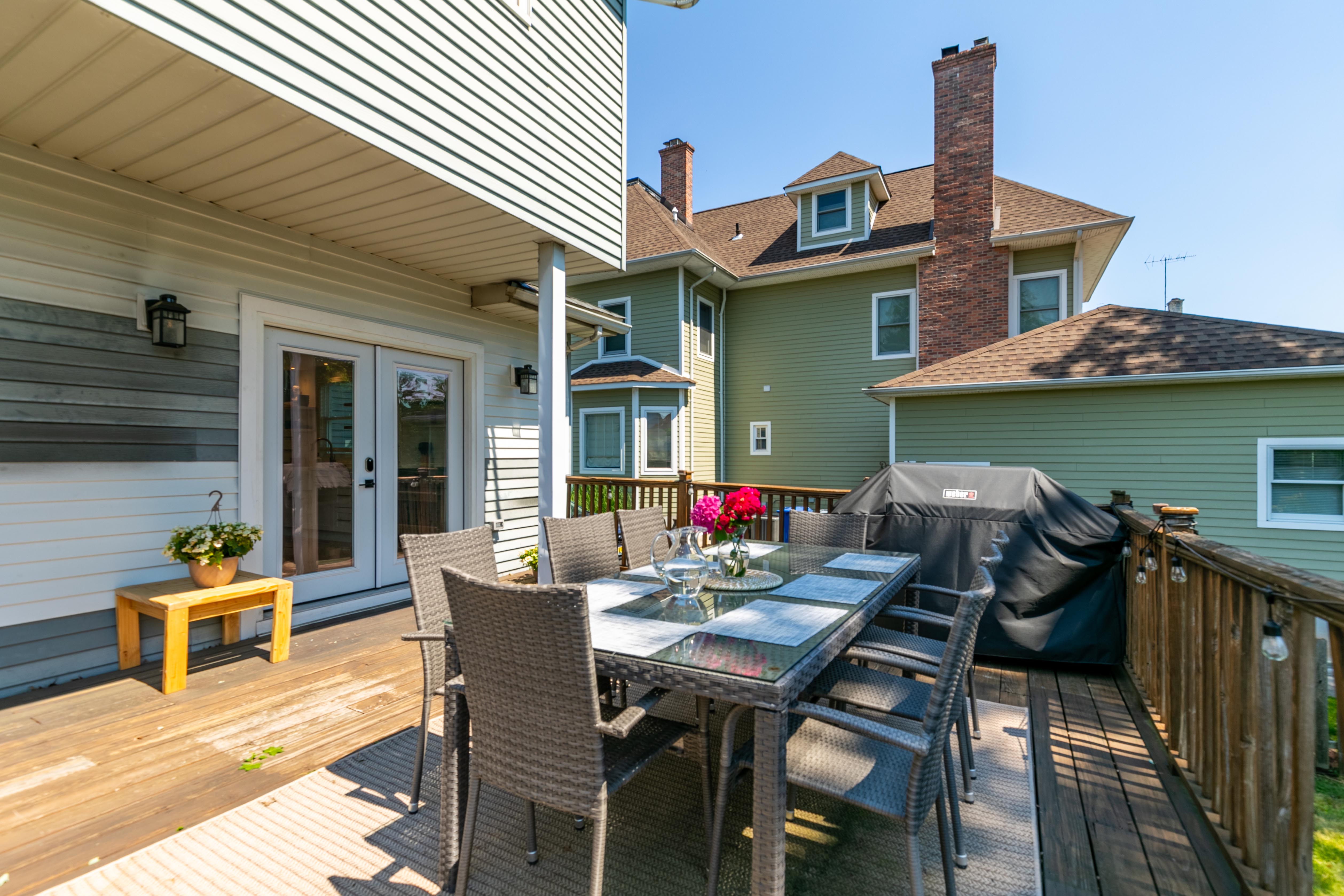 163 Ridge Road Rutherford, NJ 07070 - Photo 41 of 59 a view of a chairs and table on the terrace