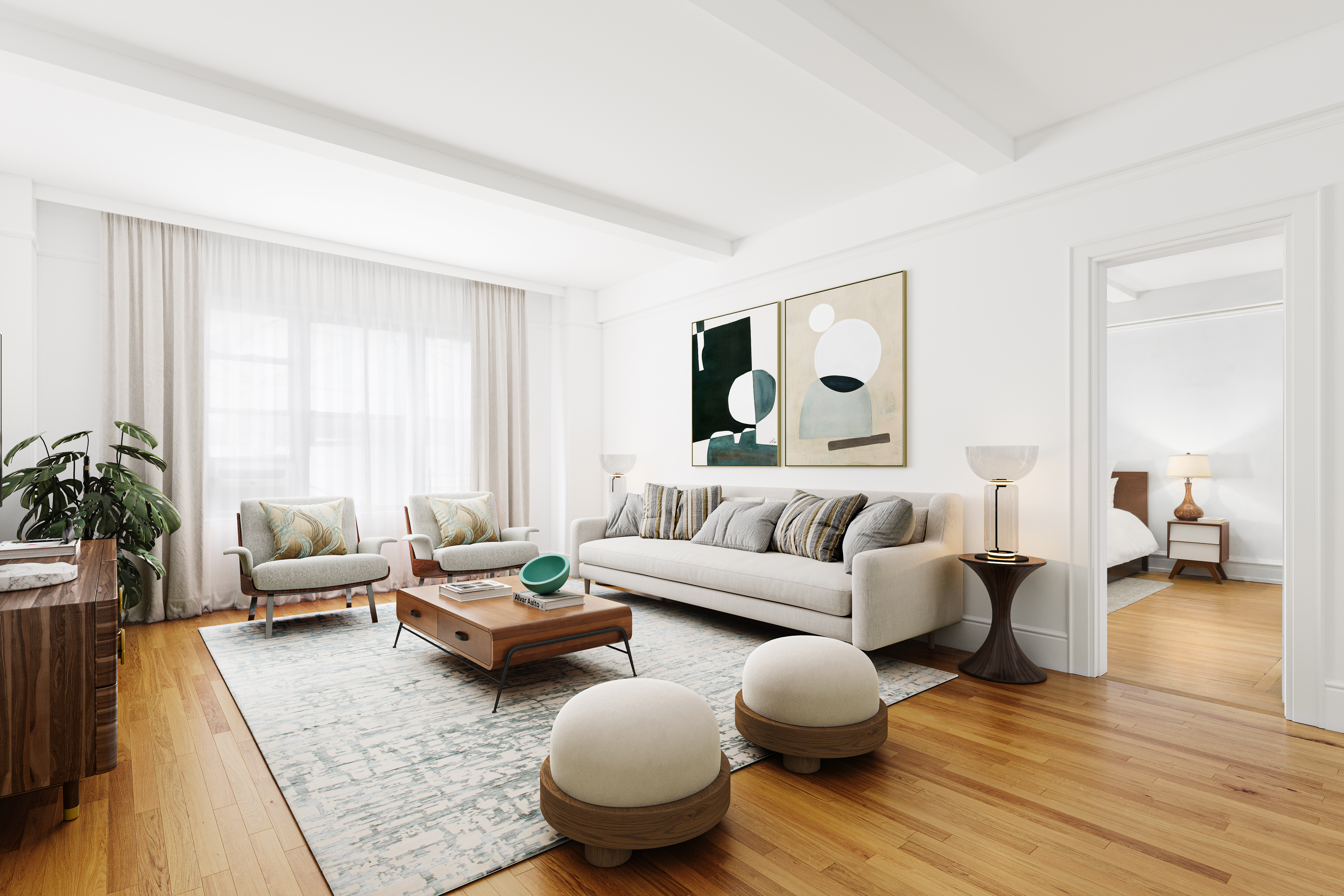 a living room with furniture and wooden floor